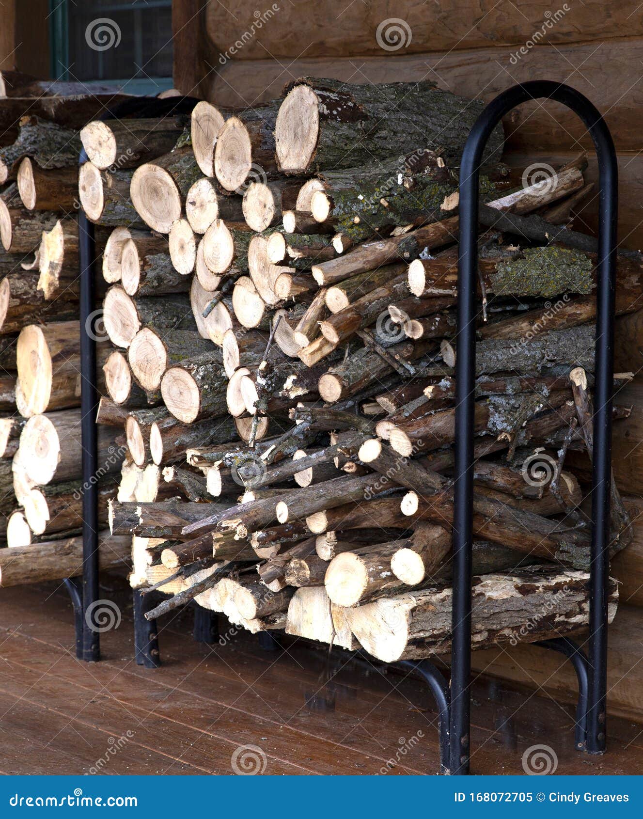 Rack of firewood on porch stock image. Image of firewood 168072705