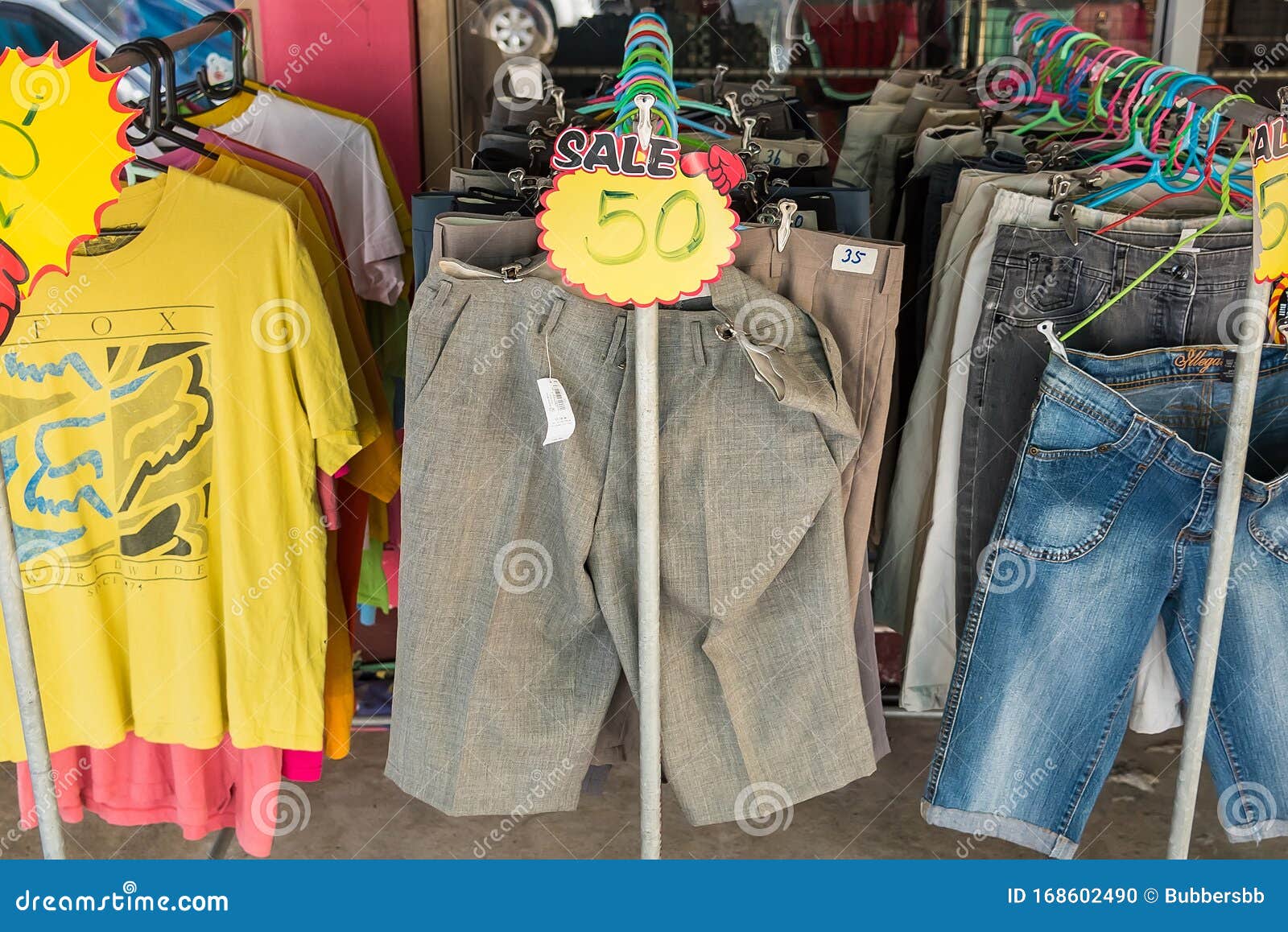 A Rack of Mens Pants in a Second Hand Shop Stock Photo Image of