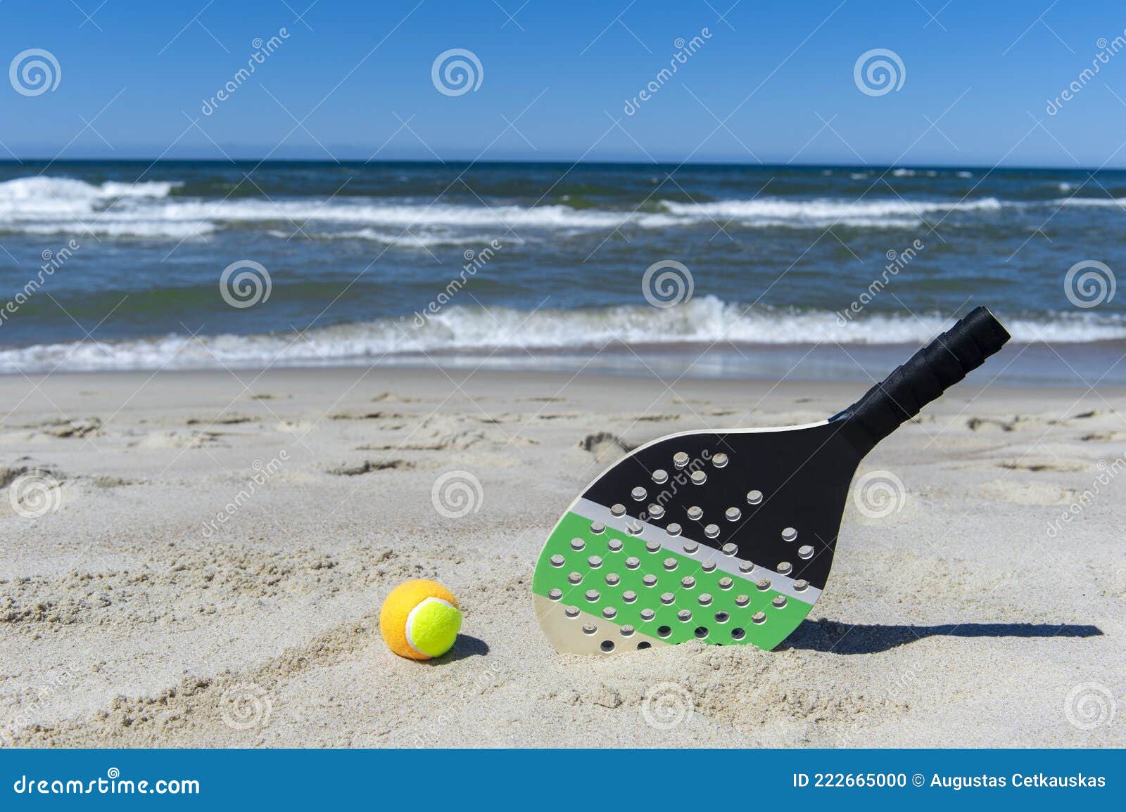 Racket and Ball on the Sandy Beach. Summer Sport Concept Stock Photo ...