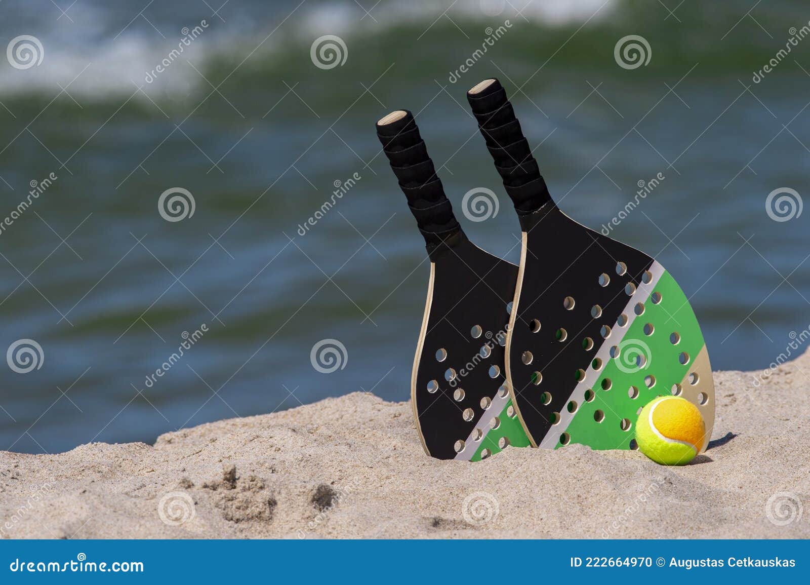 Rackets and Ball on the Sandy Beach. Summer Sport Concept Stock Photo ...