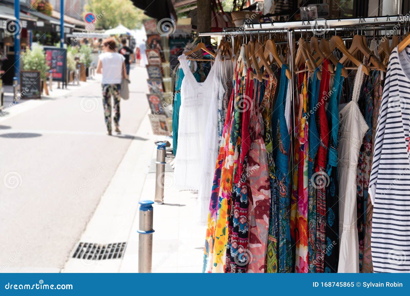 Racks with Clothes Street Shop Outdoors Store Sells Clothes in City ...