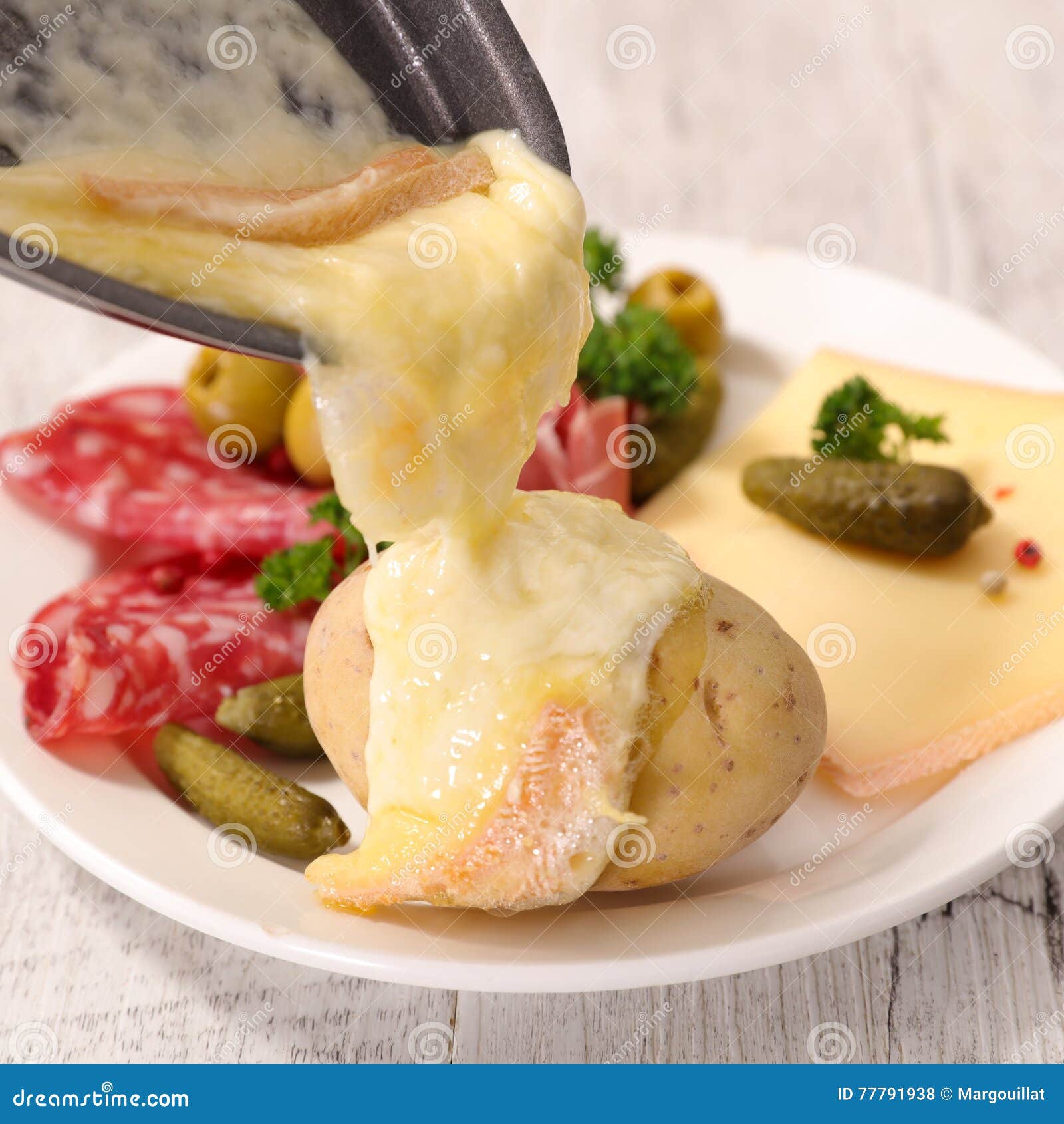 Raclette stock photo. Image of pour, meat, food, dinner 77791938