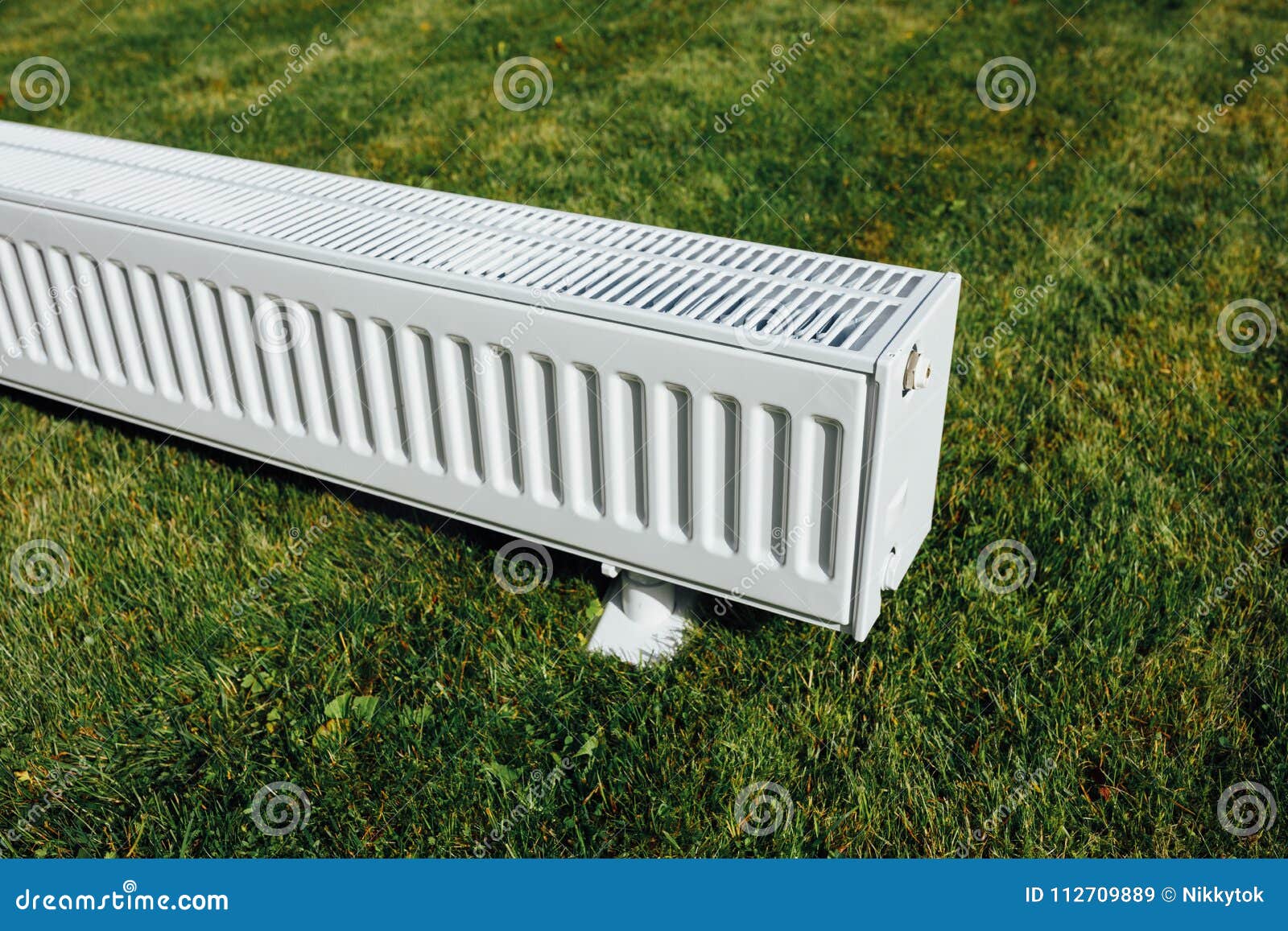 Radiator on Green Lawn, Ecological Heating Concept Stock Image Image