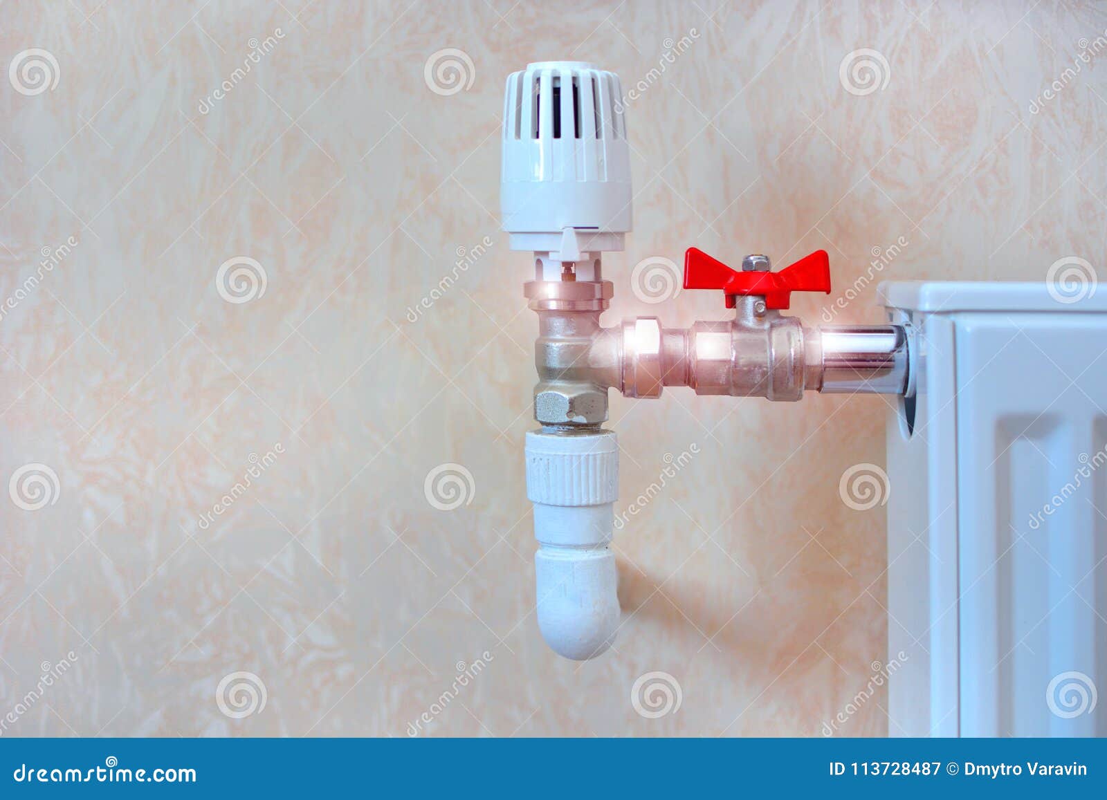 A Radiator with Thermal Head and Water Tap. Stock Image Image of