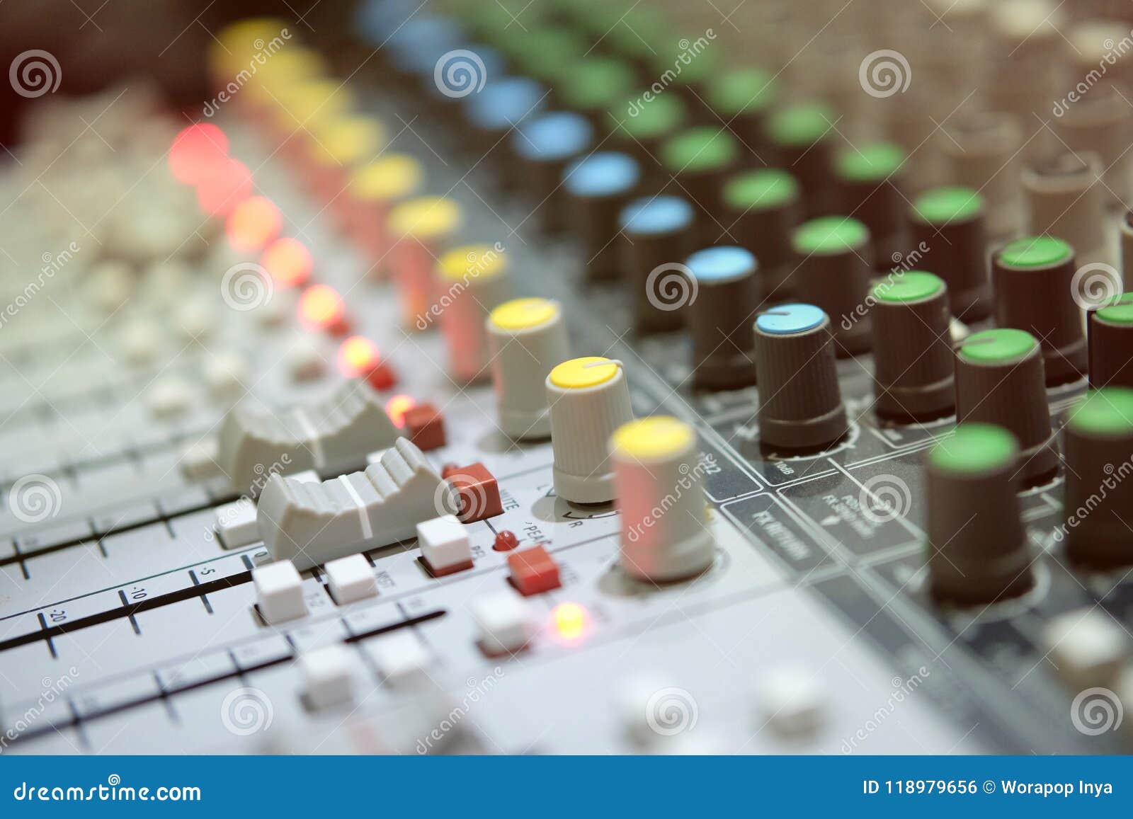 radio analog mixer in broadcast room with blur backgound