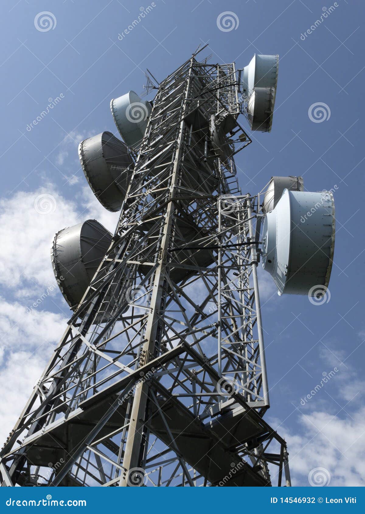 Radio Antenna Architecture Tower And Water Tower On Top Of A Snowy