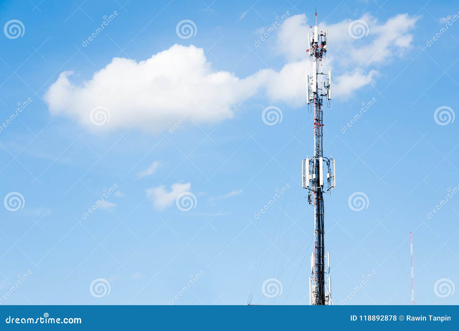 radio transmitters,cell phone antenna and communication towers with blue sky