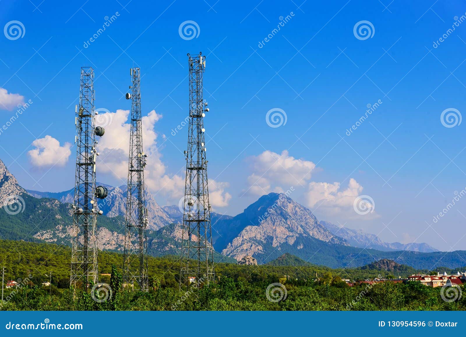 Radio and TV Antennas on the Background of Mountains Stock Photo