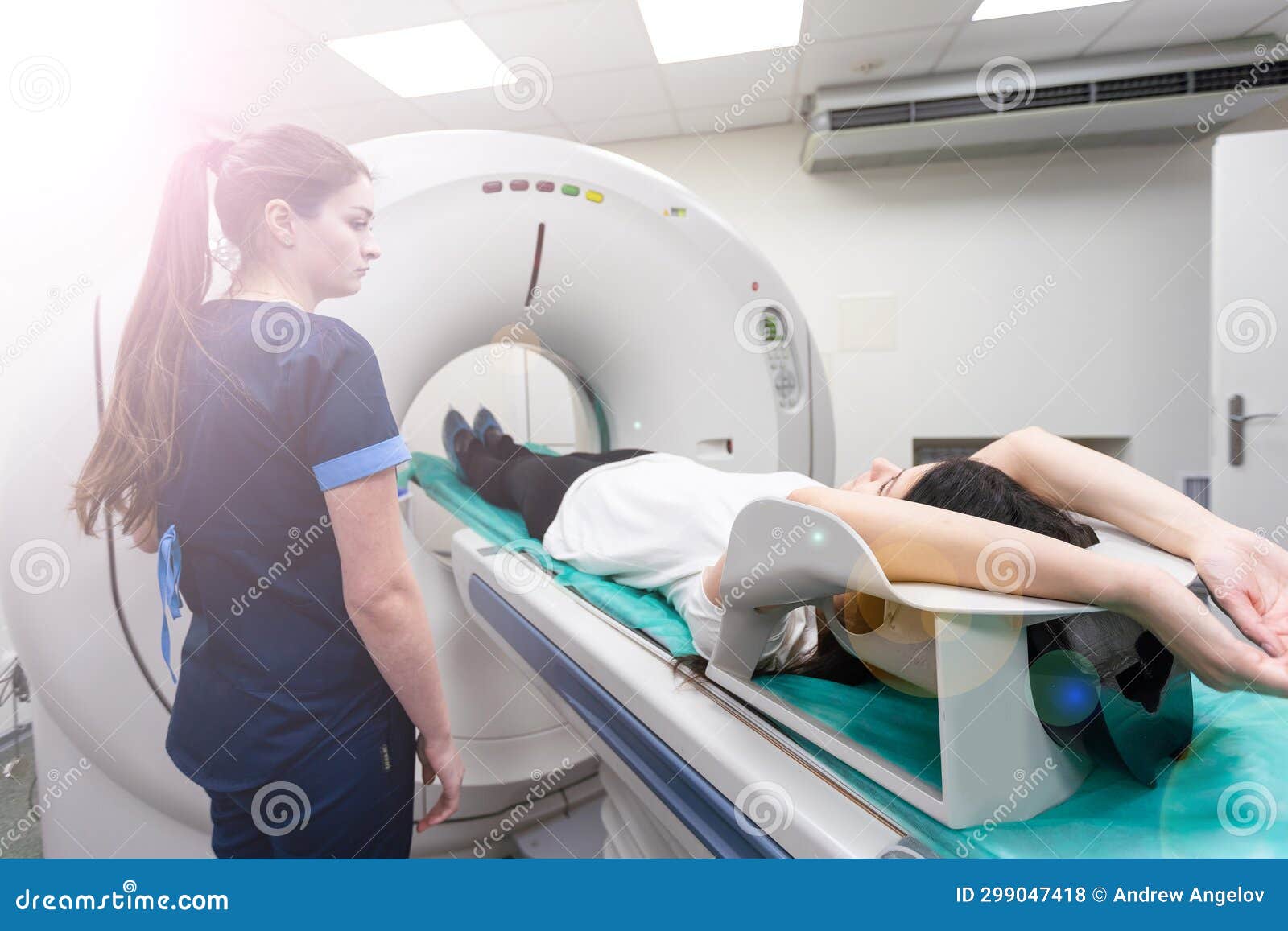 Radiologic Technician and Patient Being Scanned and Diagnosed on