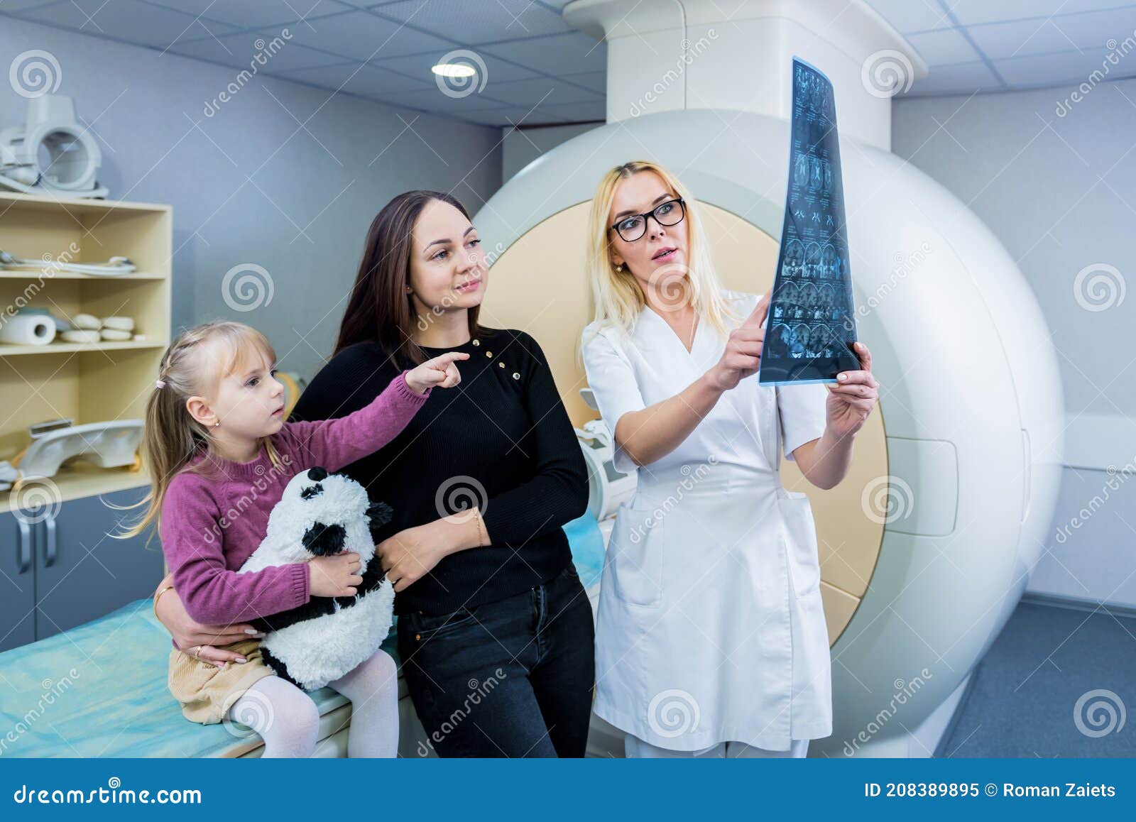 Radiologist with a Patients Examining a Mri Scan Stock Image Image of