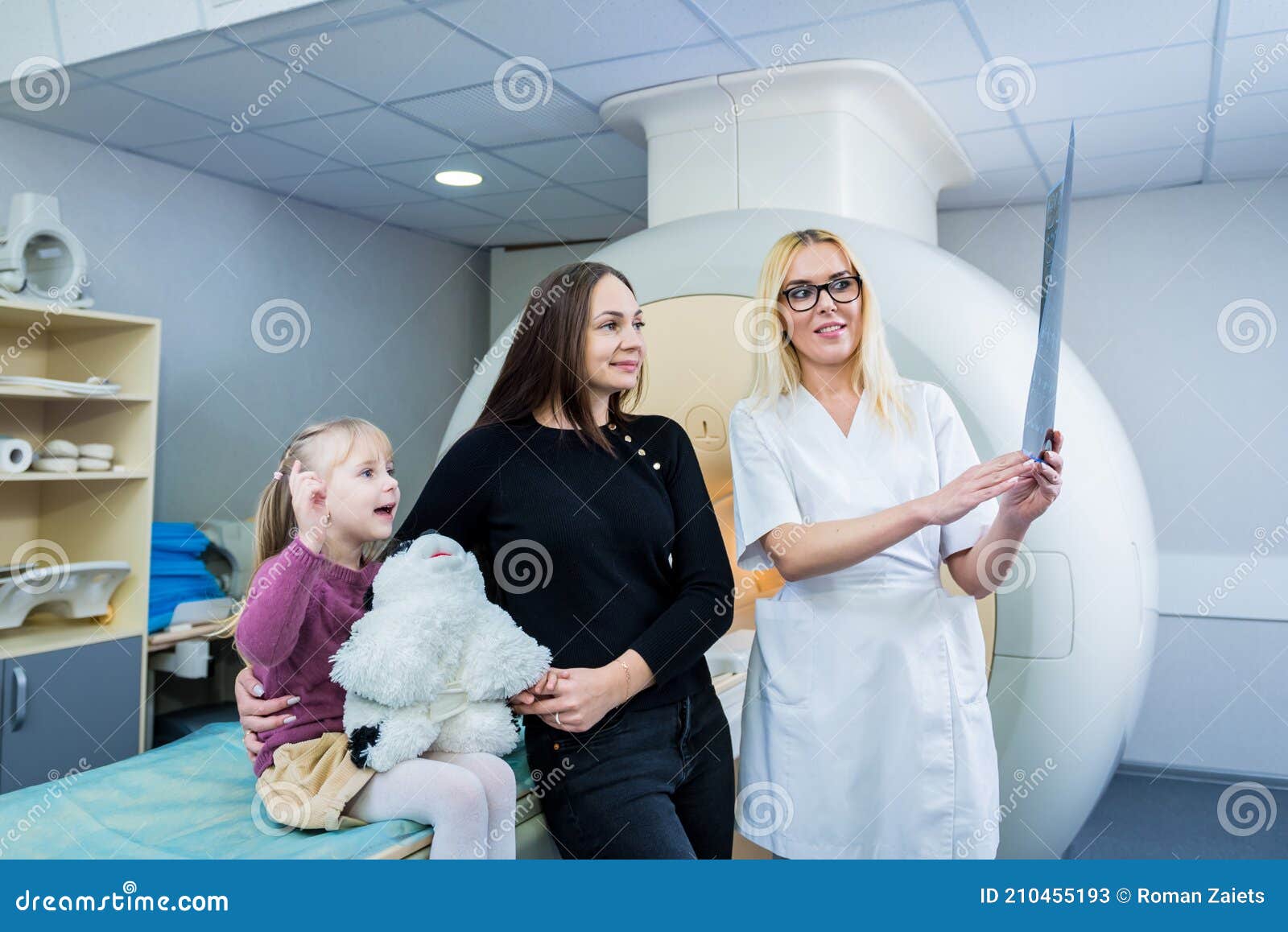 Radiologist with a Patients Examining a Mri Scan Stock Image Image of