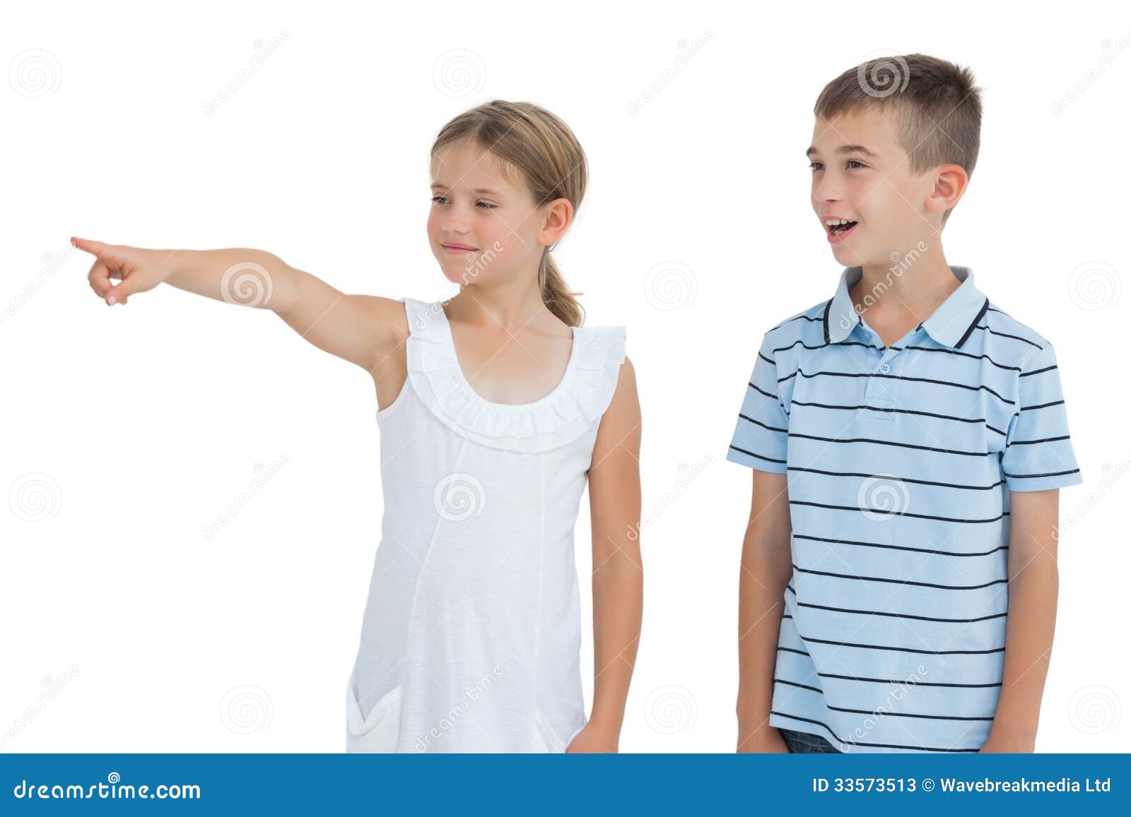 Ragazza Che Mostra Qualcosa a Suo Fratello Immagine Stock Immagine di