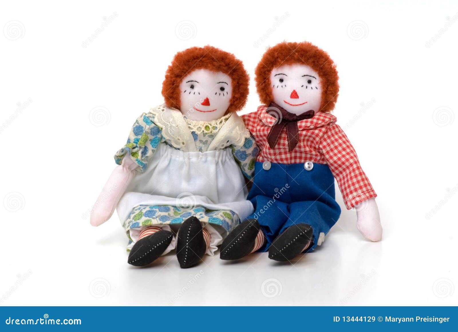 Raggedy Ann and Andy Cloth Dolls Sitting Together Editorial Stock Image
