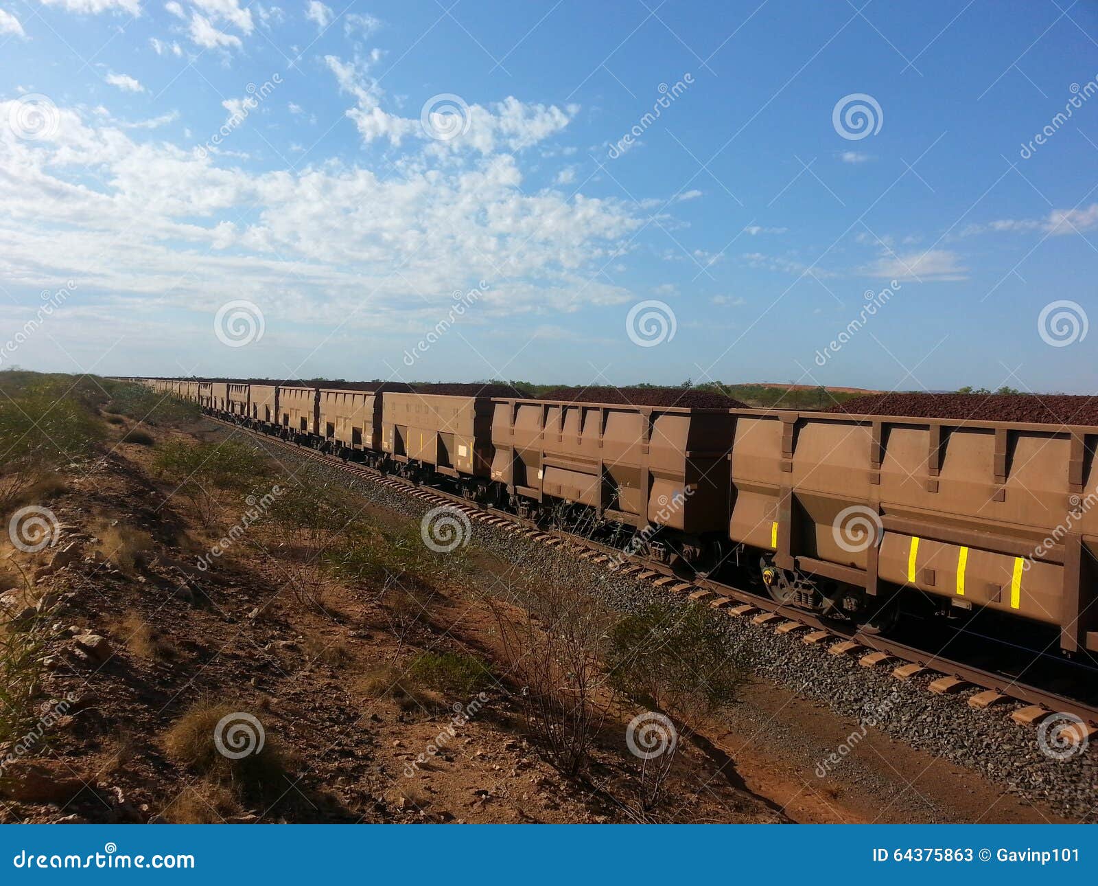 rail carriages filled with iron ore western australia