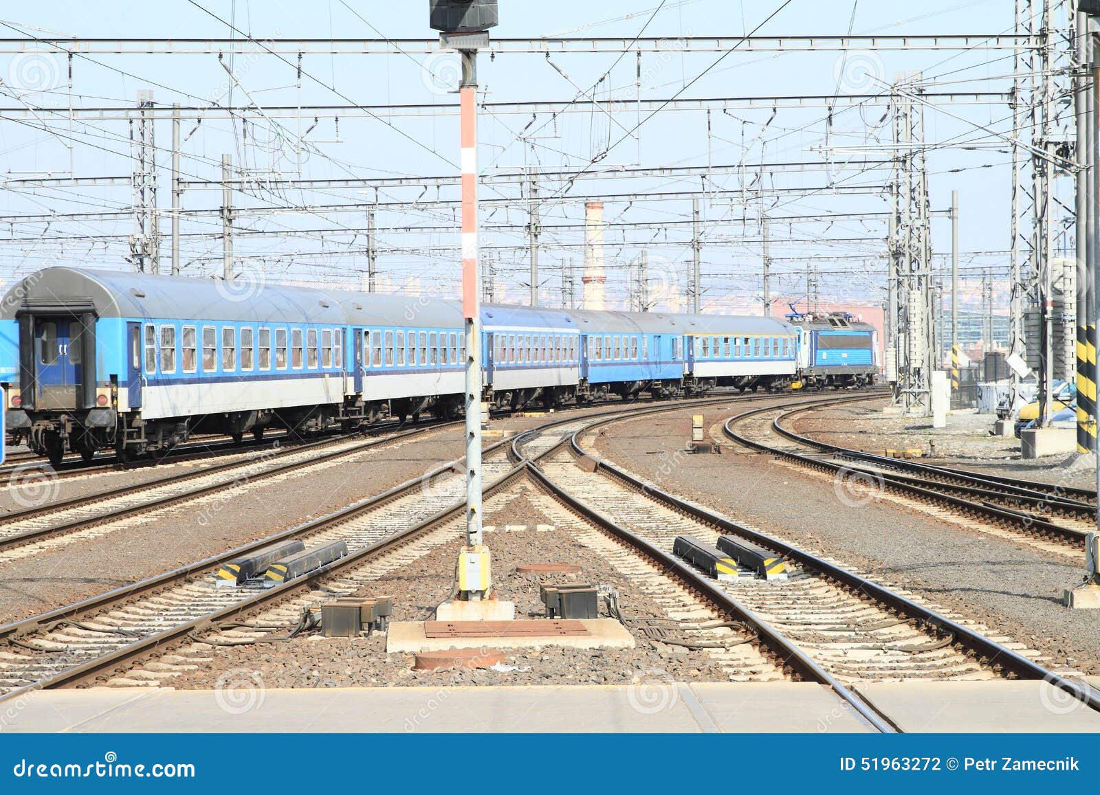 Railroad with blue train stock photo. Image of rail, wagons 51963272