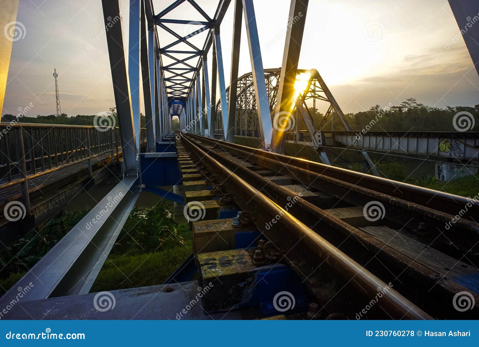 Railroad Bridge. Suspension Bridge Across the Railroad Tracks Stock