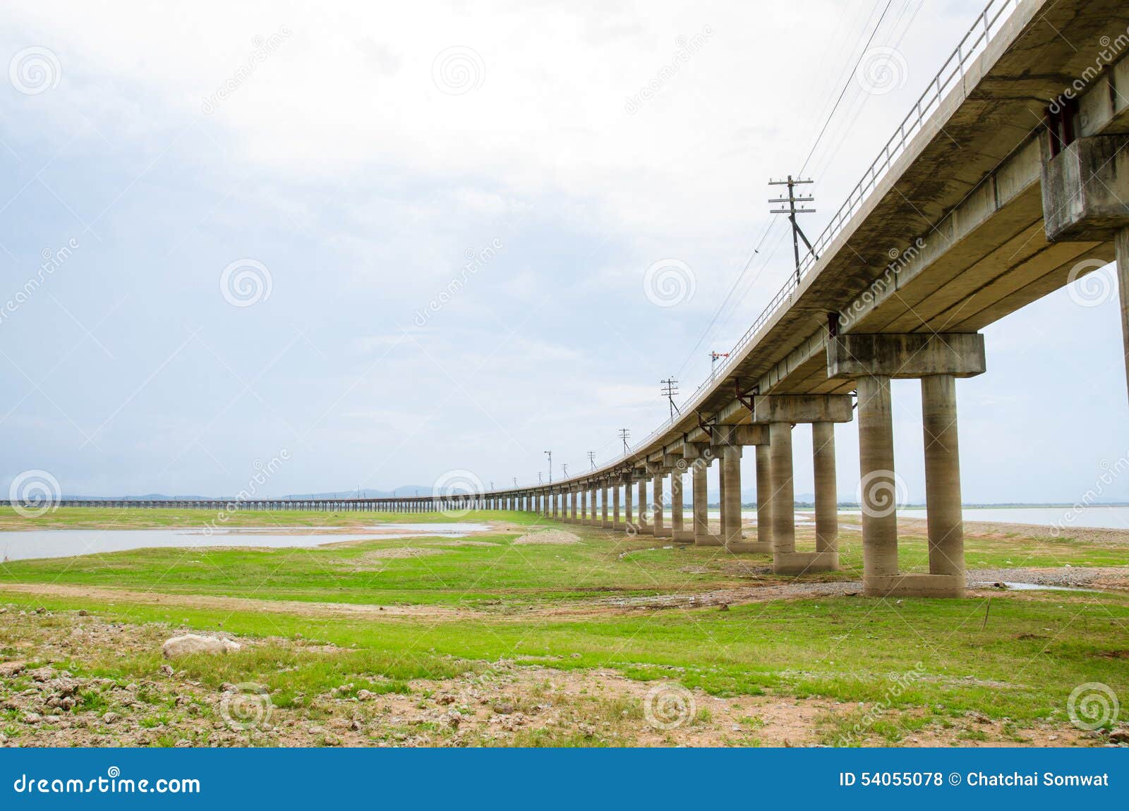 Railroad tracks into the reservoir, Pa Sak Jolasid Dam, Lopburi Thailand.