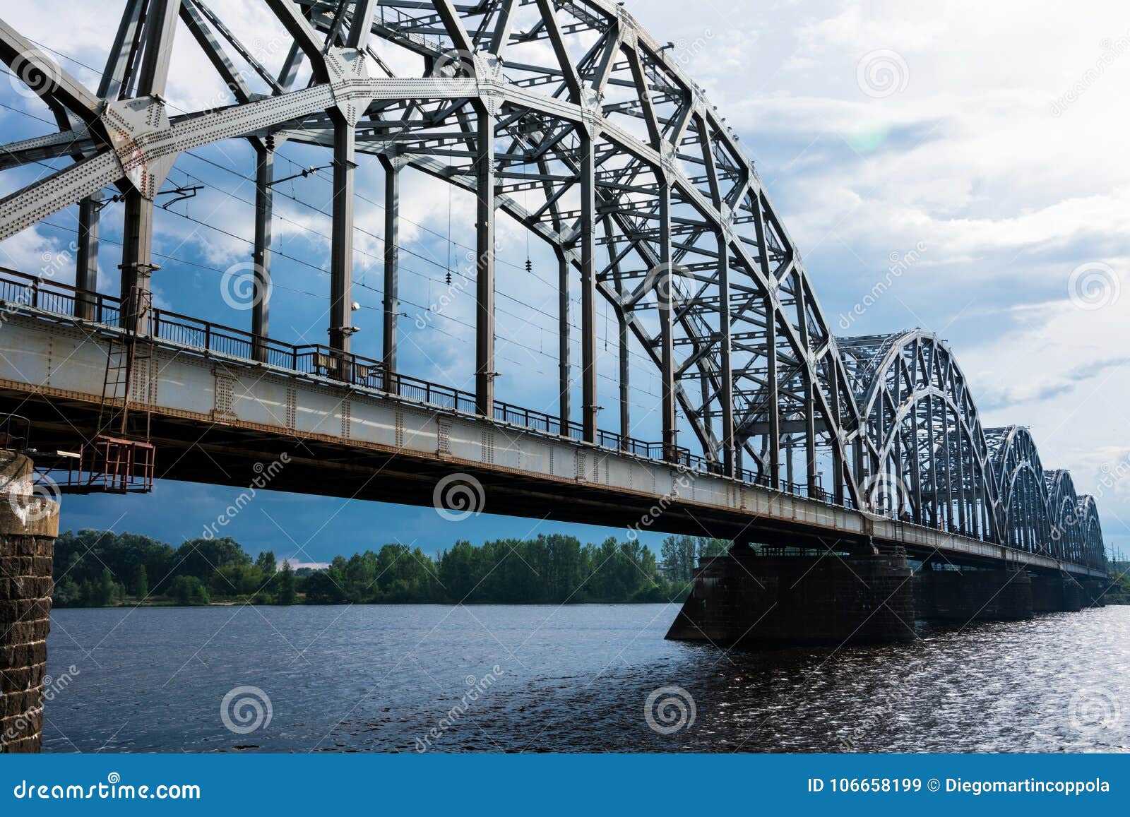 railway bridge dzelzcela tilts over daugava river