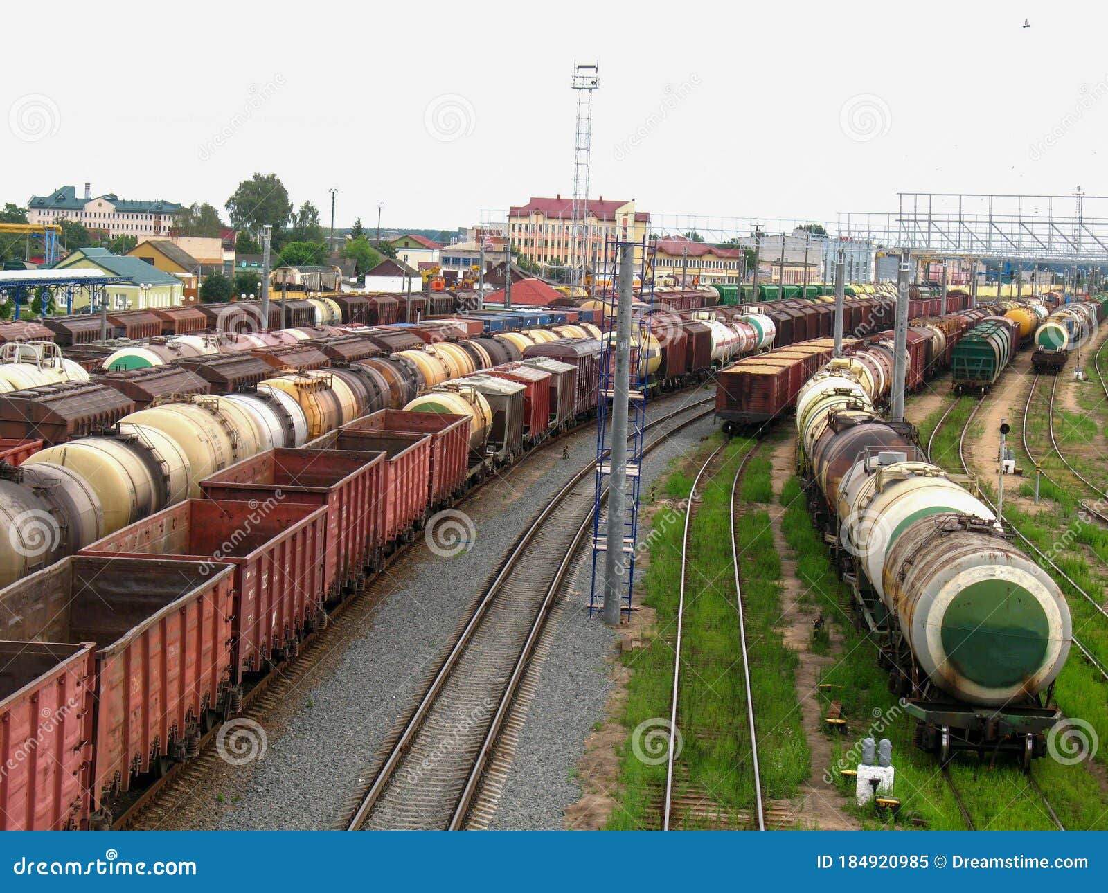 Railway Tanks and Wagons Standing in a Depot Waiting for Their Turn for Railway Tanks and Wagons Standing in a Depot Waiting for Their Turn for