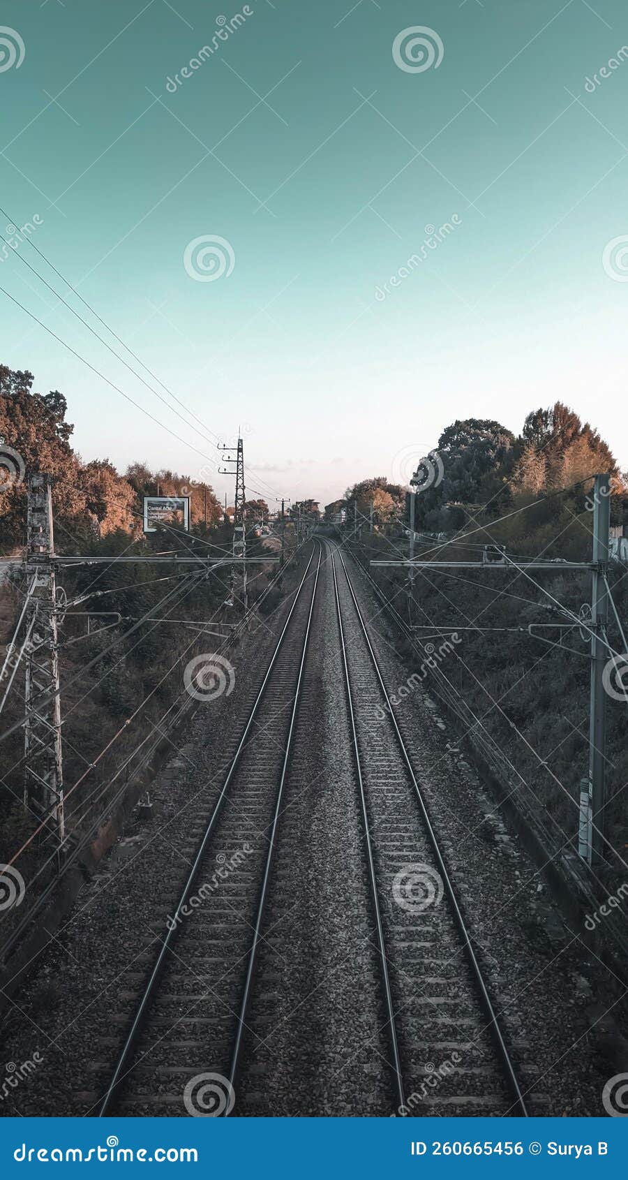 Railway Track in a City Suburb during Sunset. Stock Photo Image of