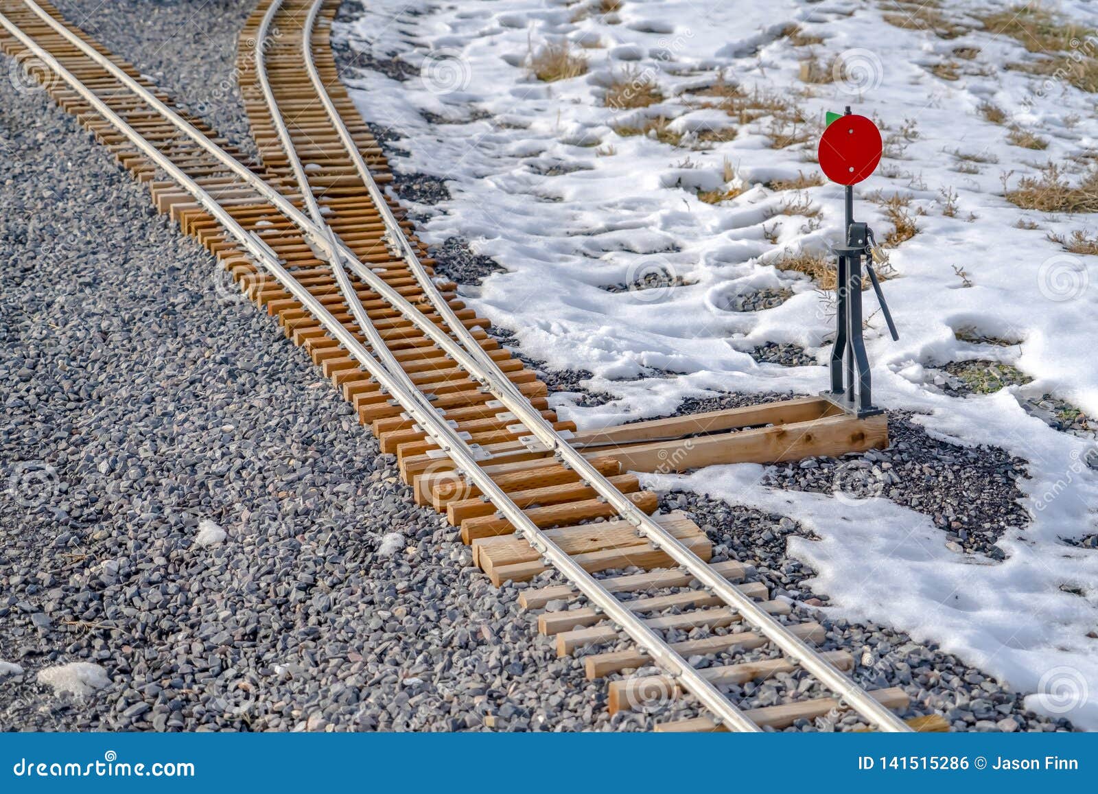 railways junction on a rocky ground with snow