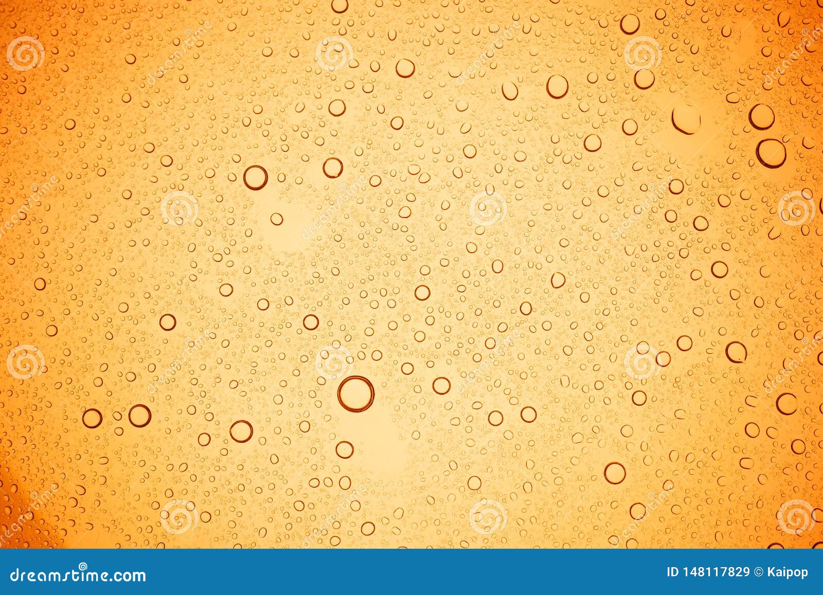 Rain Droplets on Yellow Glass Background, Water Drops on Yellow Glass