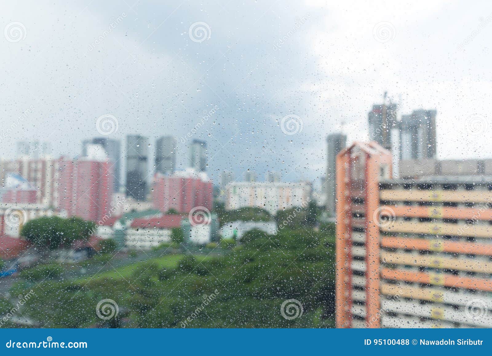 Rain Drops on Window, Rainy Day and Apartment Urban Scene Stock Photo