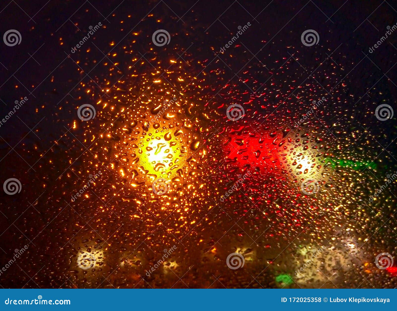 Rain Drops On Window With Road Light Bokehwater Drop On The Glass