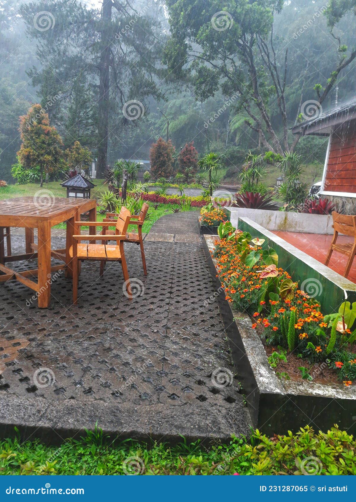 Rain soaks outdoor seating stock image. Image of property 231287065