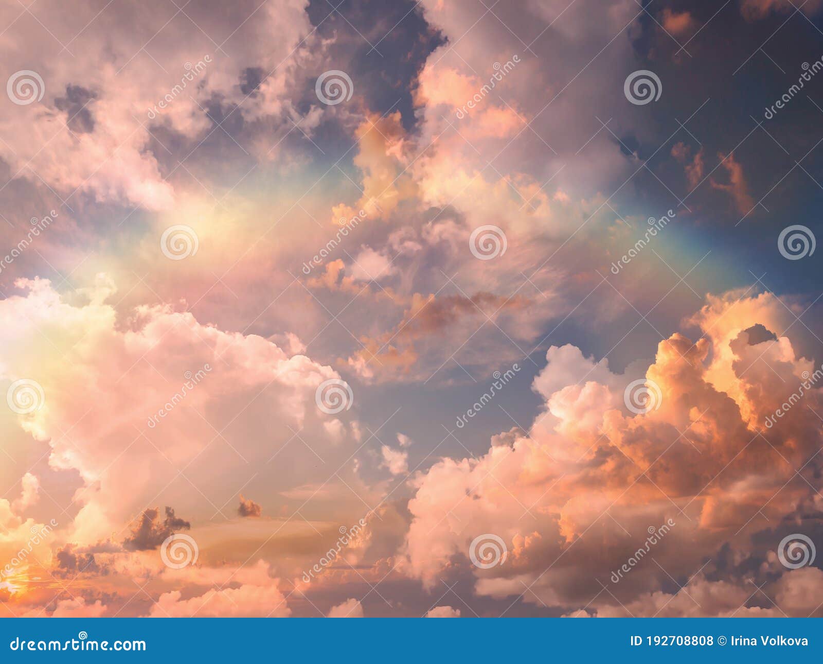 rainbow at blue pink sunset sky fluffy clouds and sunlight beams skyline  nature landscape weather forecast