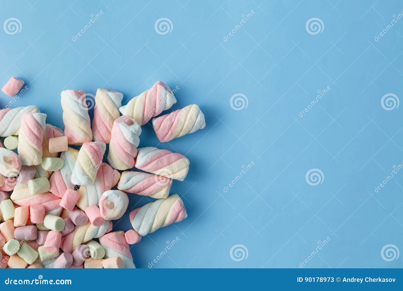 Rainbow Color of Spiral Marshmallows on Blue Background Stock Image Image of raspberry