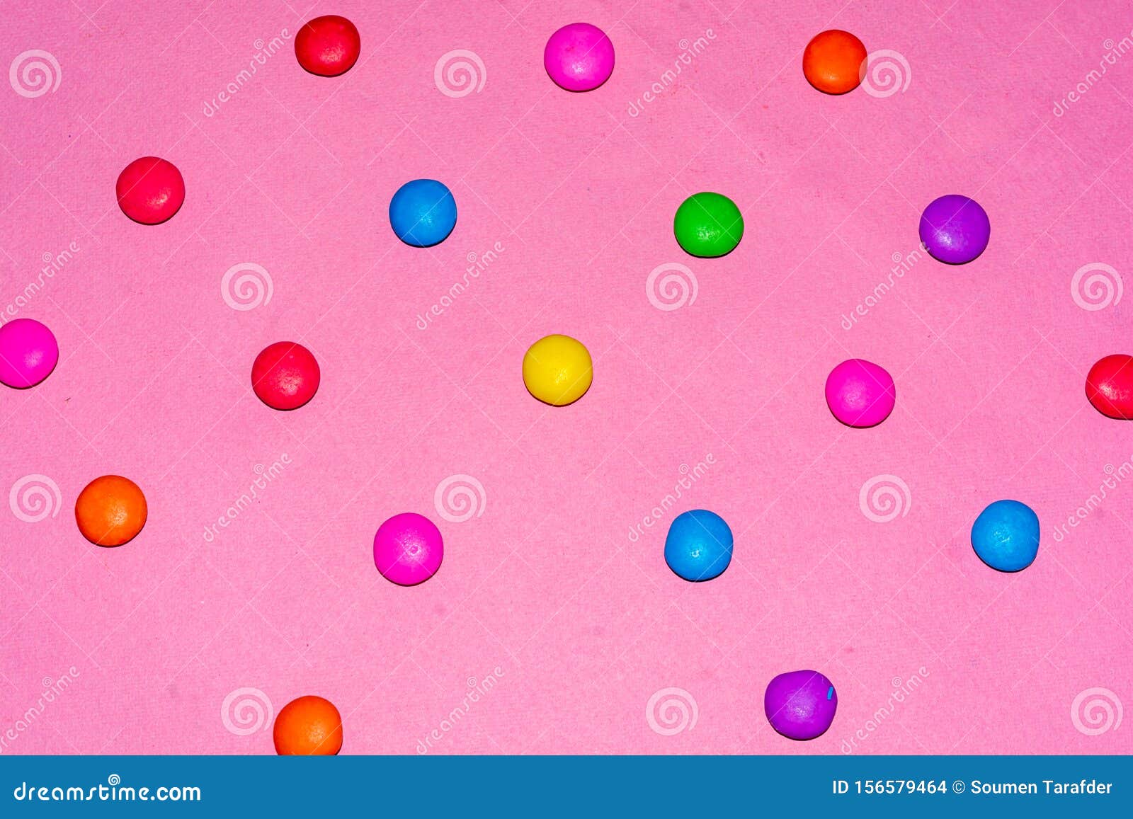 Chocolate Coated Candies on Pink Background Stock Photo Image of