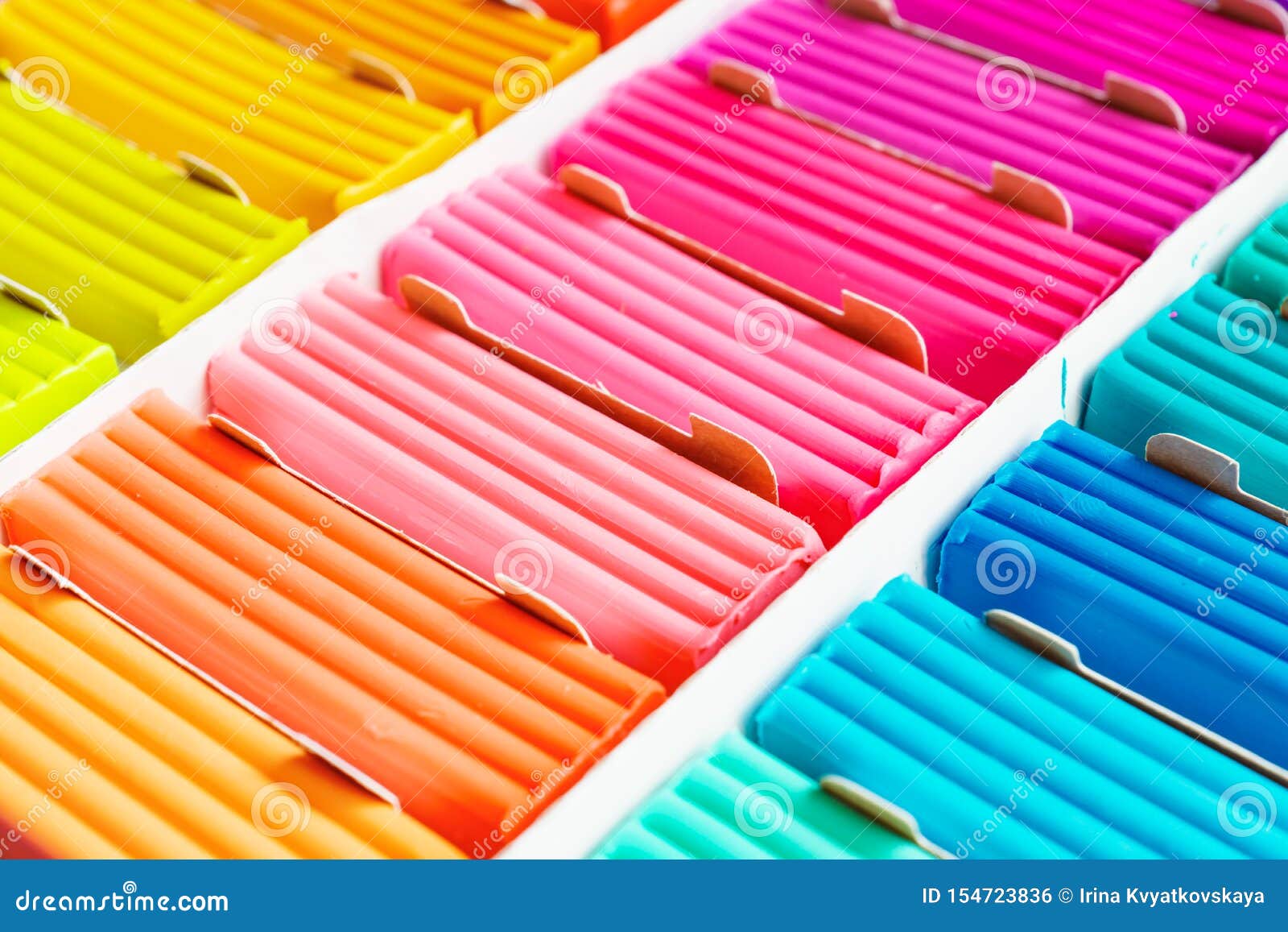Rainbow Colors of Modeling Clay. Multicolored Plasticine Bars Ina Box, Background Texture Stock