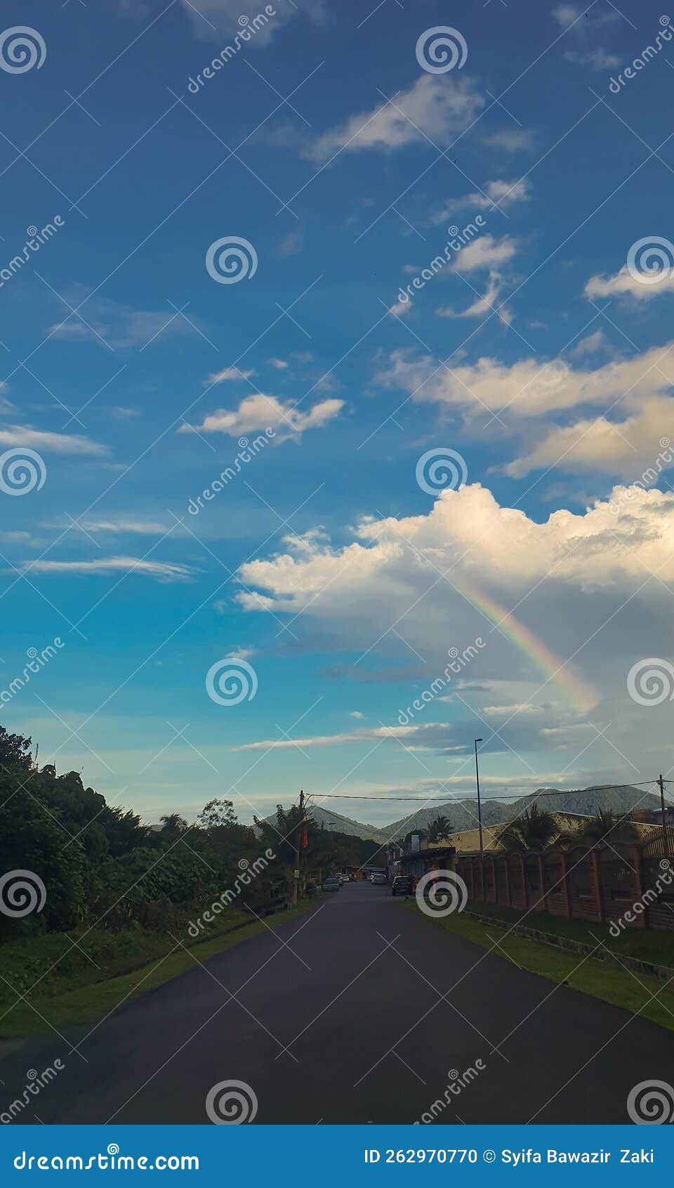 Rainbow comes after rain stock photo. Image of cumulus 262970770