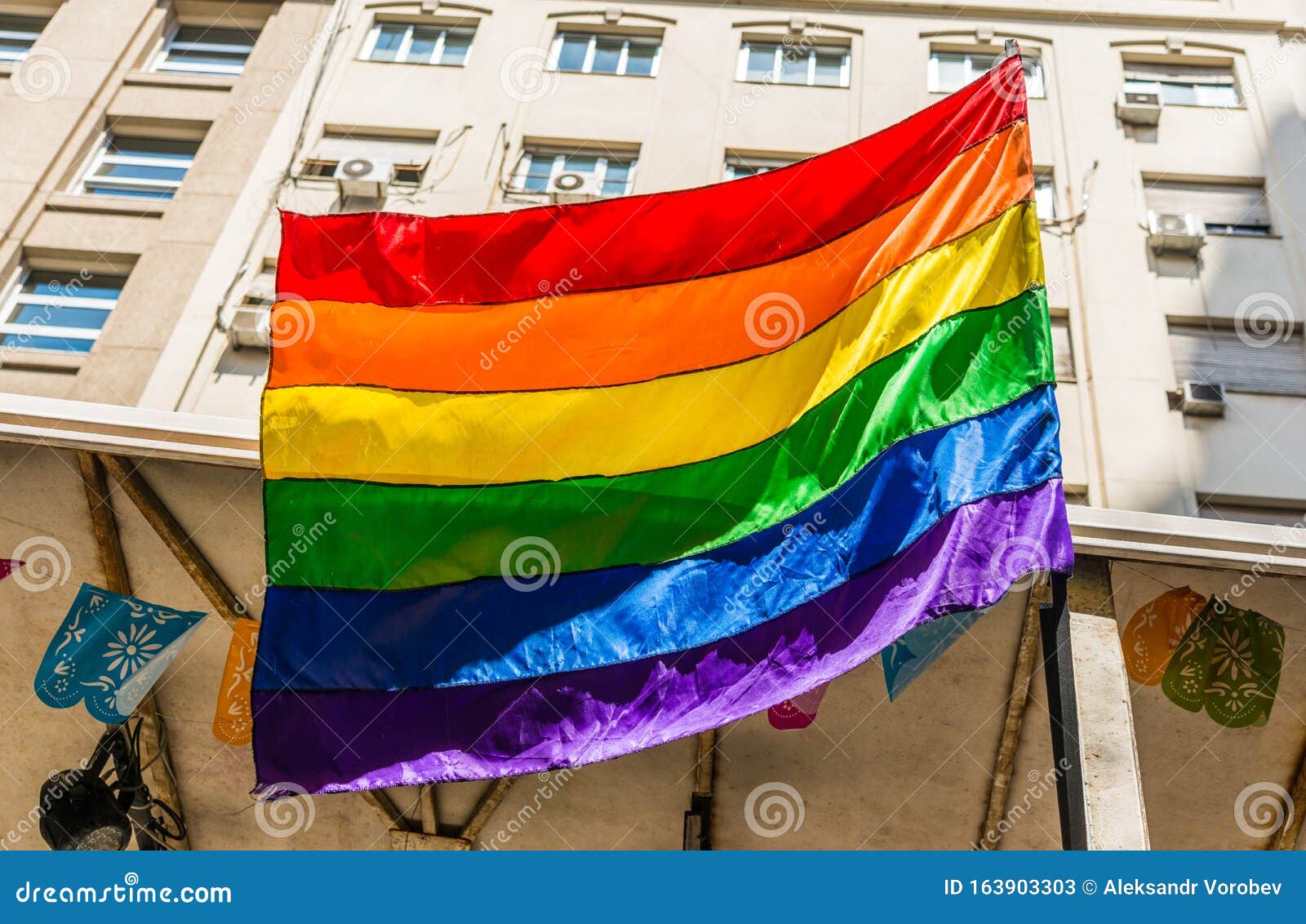 rainbow flag at a pride day gay, lesbian, and lgbt parade.
