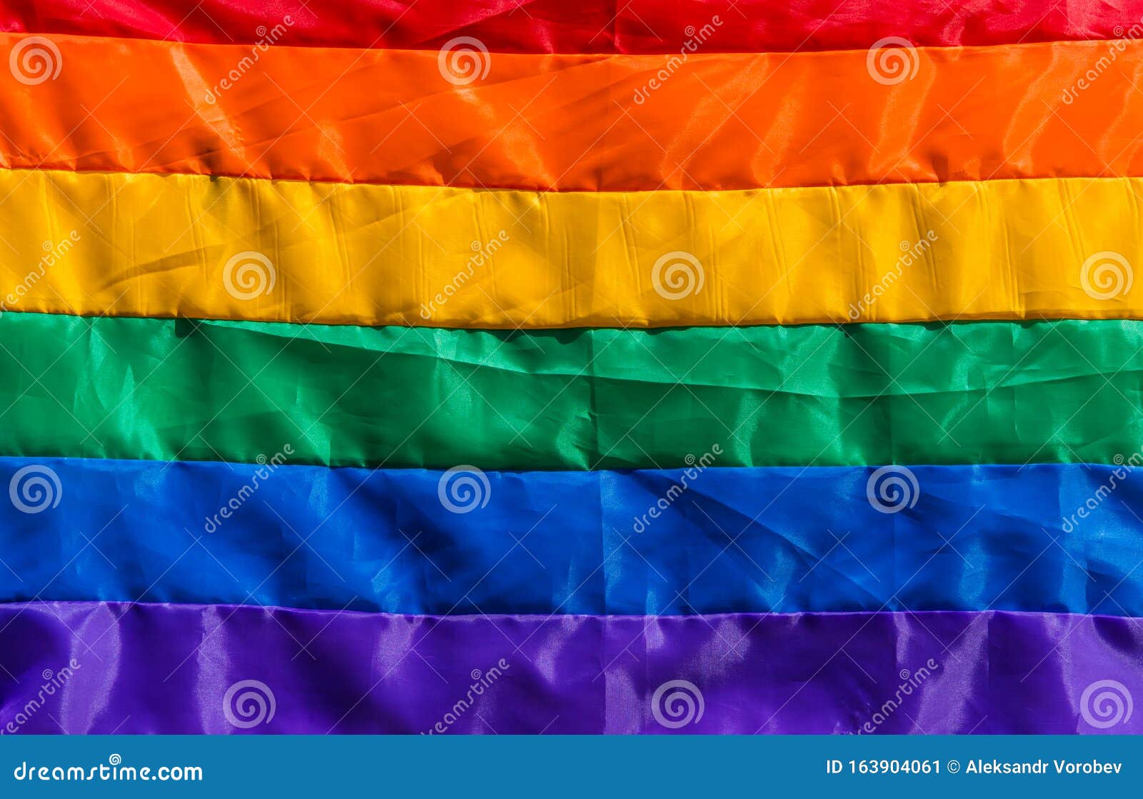 rainbow flag at a pride day gay, lesbian, and lgbt parade.