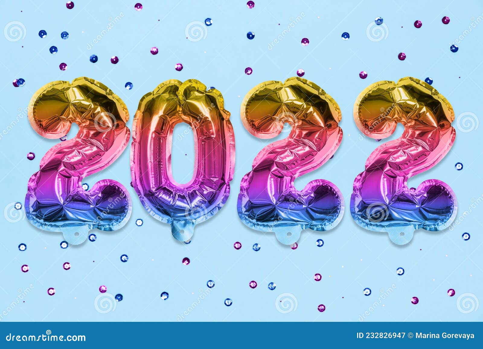 Rainbow Foil Balloon Number, Digit 2022 on a Blue Background with 