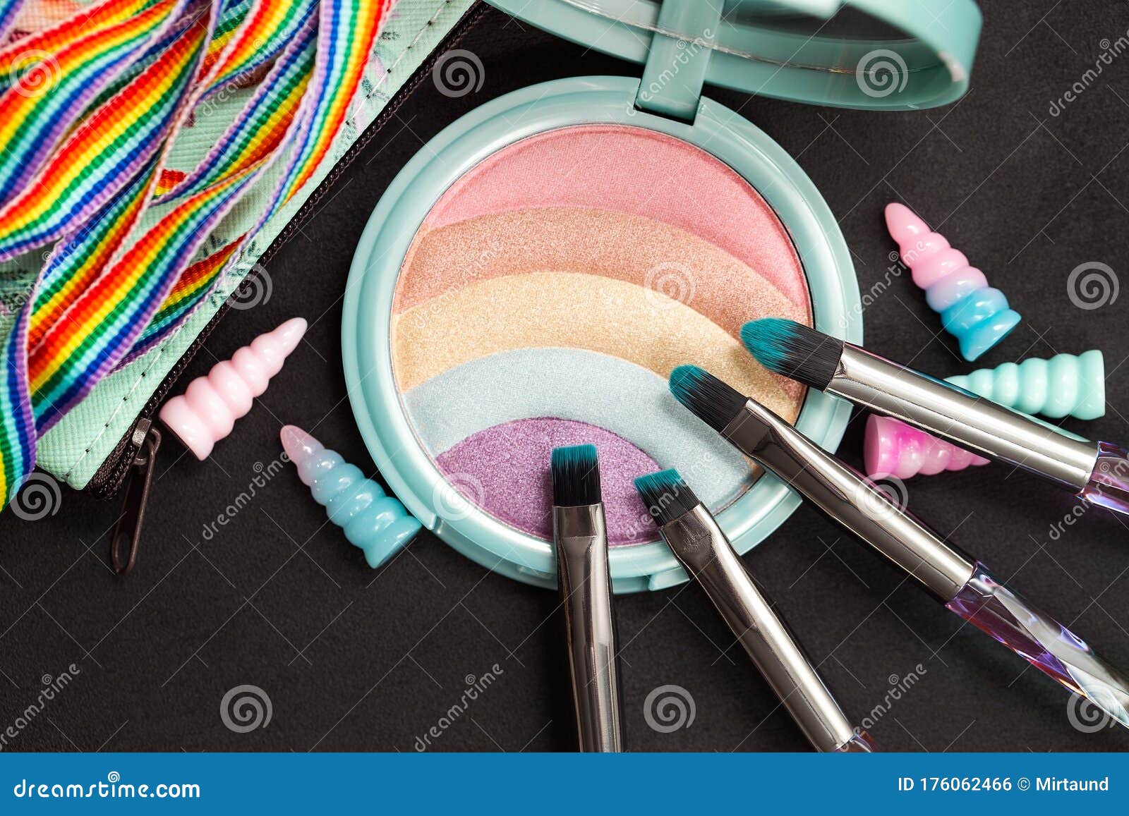 Rainbow Glitter Eye Shadow Palette and Makeup Brushes Stock Photo