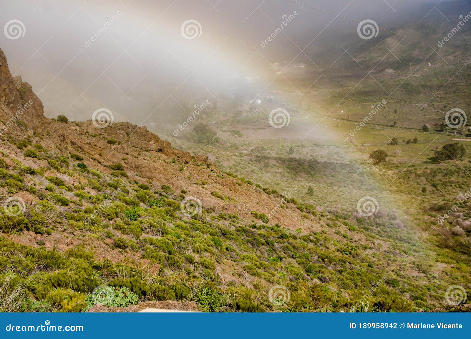 rainbow in masca in the municipality of buenavista del norte de tenerife in the canary islands. spain