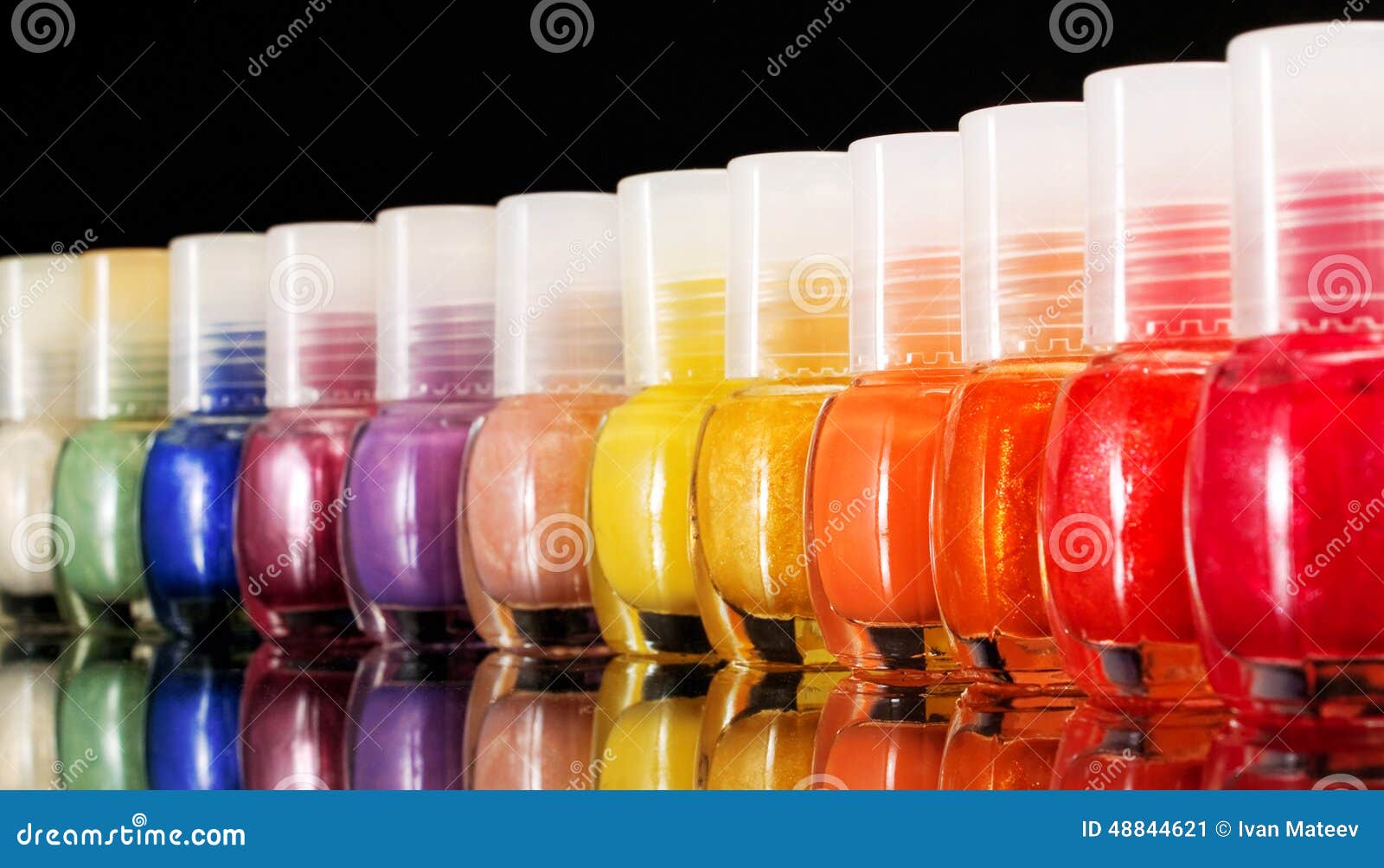 Rainbow of nail polish stock image. Image of background - 48844621
