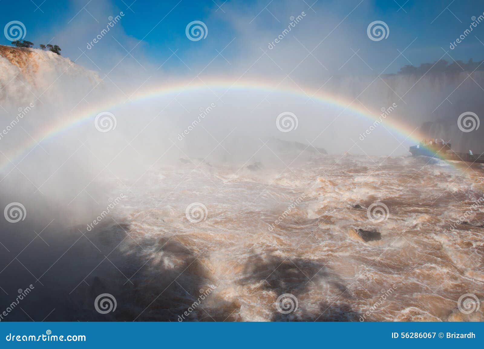 rainbow over gorgeous waterfalls of iguazu, brazil