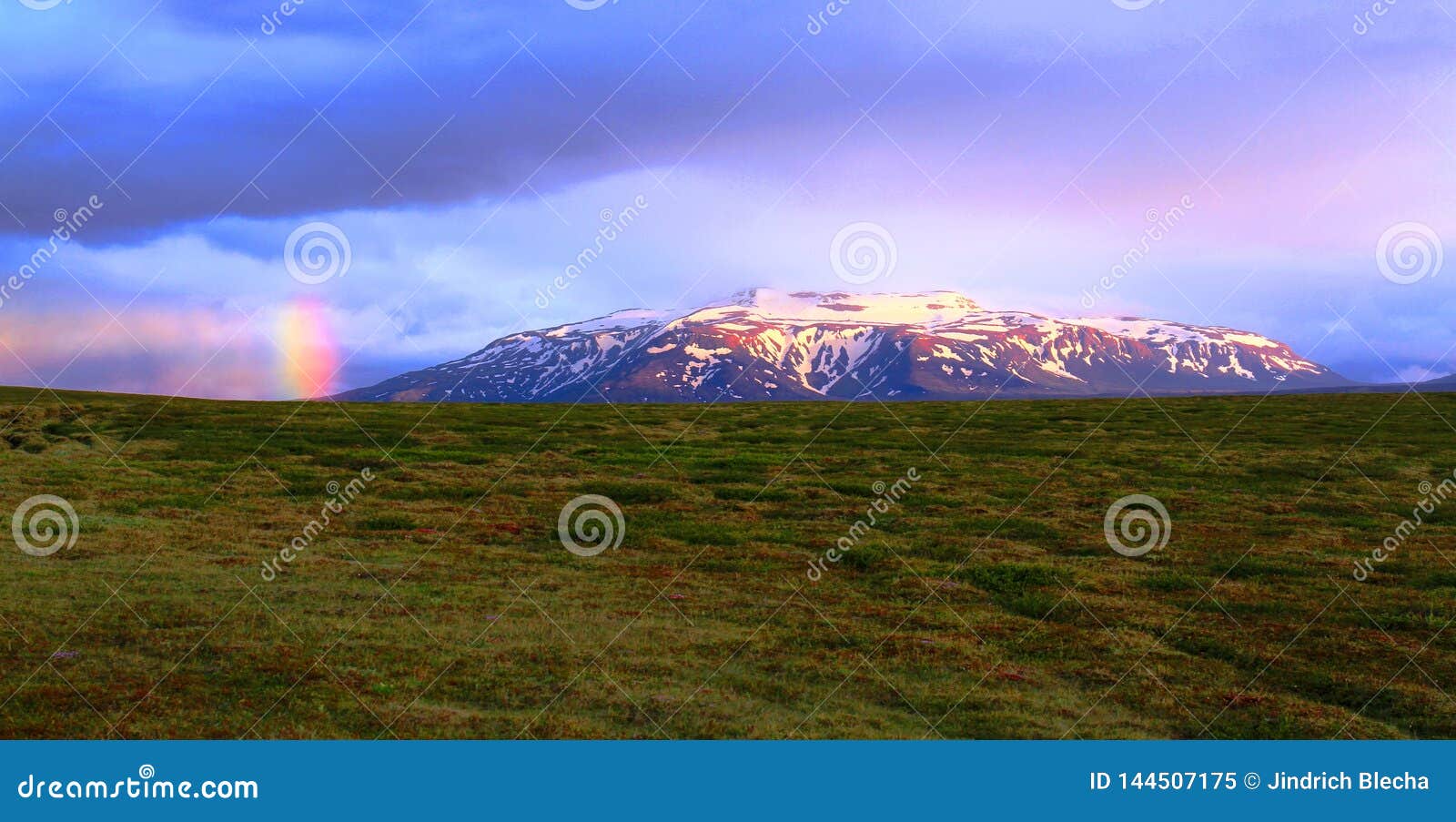 rainbow over mountains near hvitarnes hut, iceland