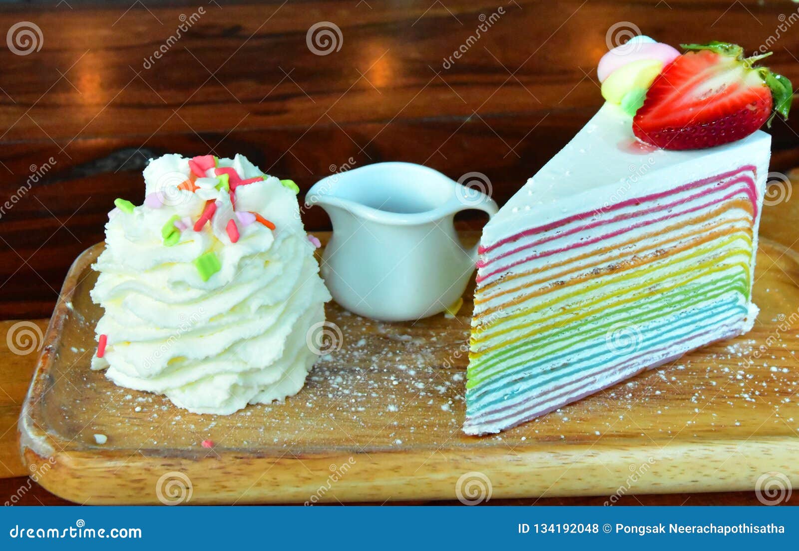 Rainbow Strawberry Crape Cake On The Table Stock Photo