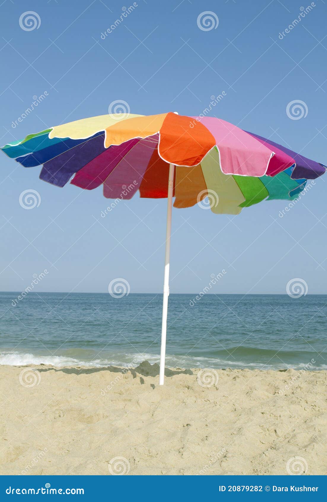Rainbow Umbrella on the Beach Stock Photo - Image of sand, blue: 20879282