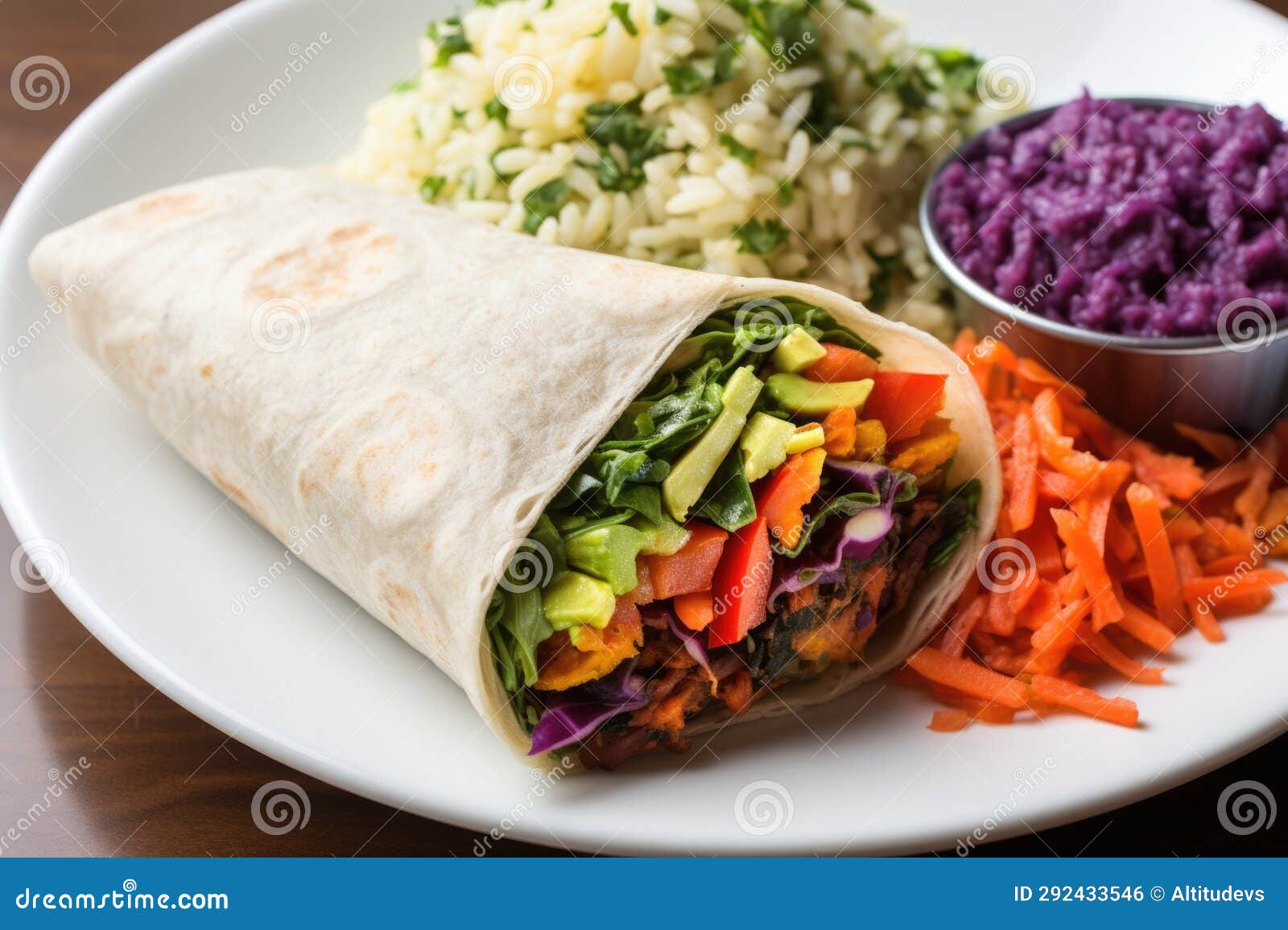 Rainbow Veggie Burrito with a Side of Seasoned Rice Stock Photo Image