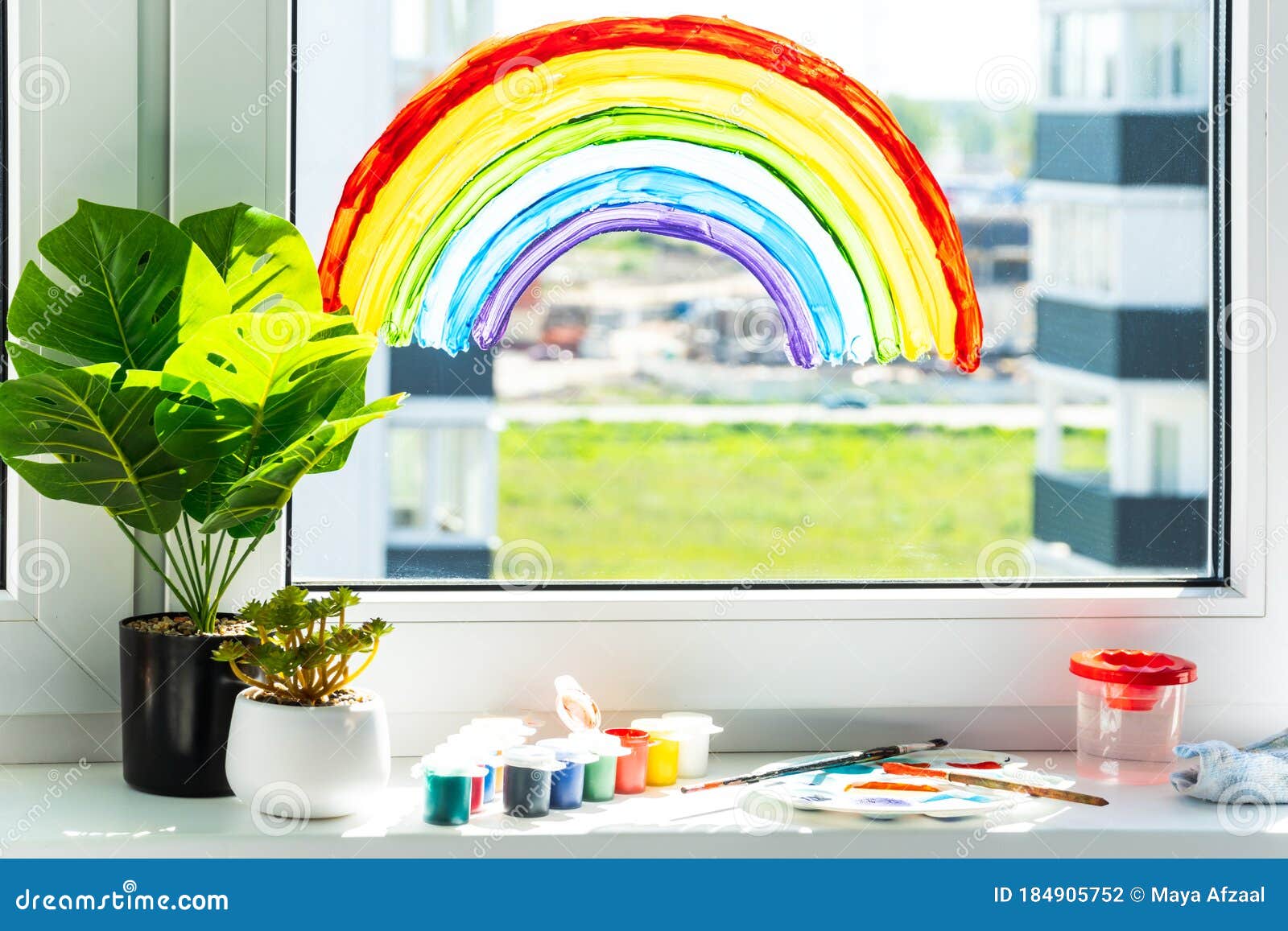 rainbow on window during quarantine at home. thank you