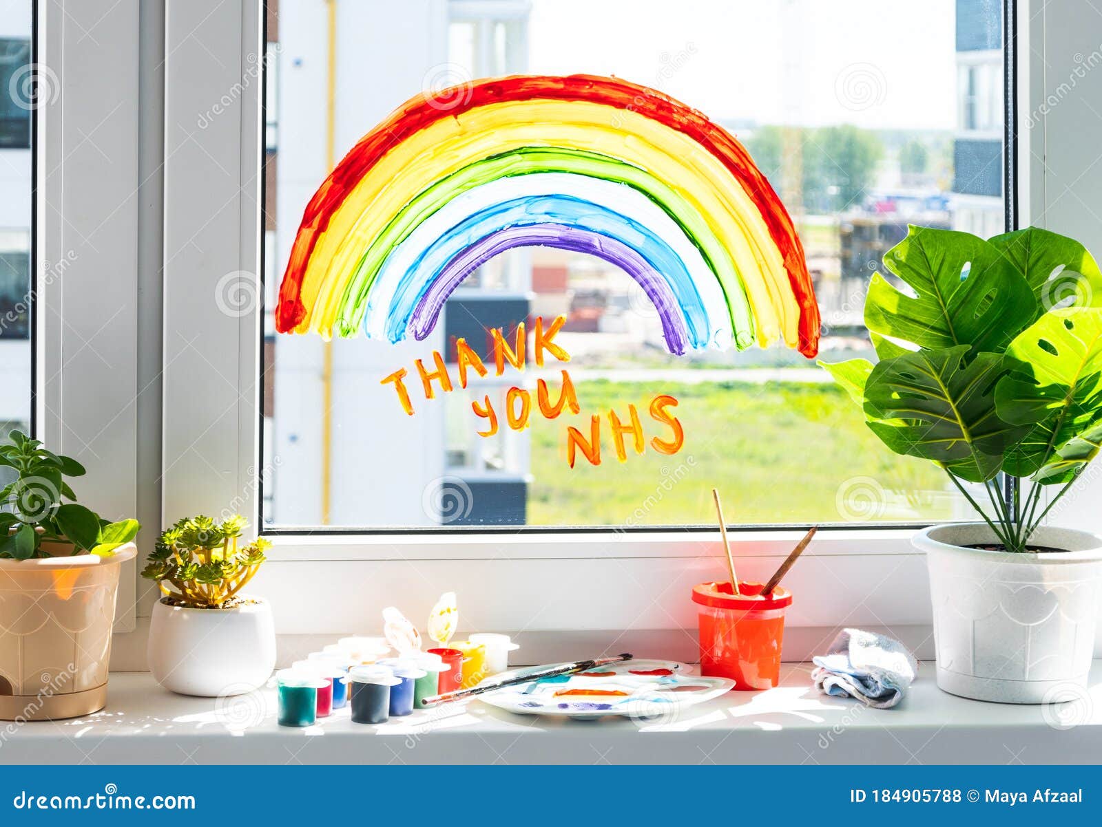 rainbow on window during quarantine at home