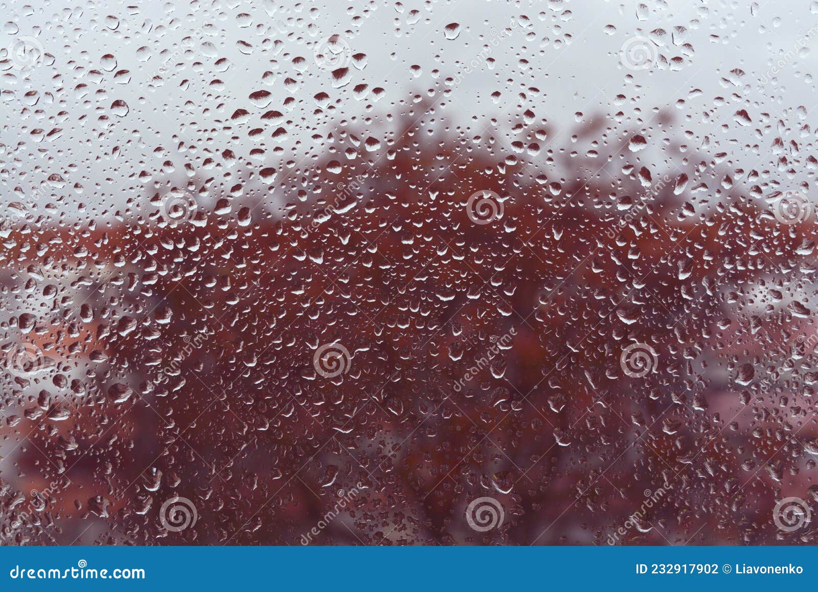 raindrops on the glass. window in march. season specific. portugal. almada. early spring.