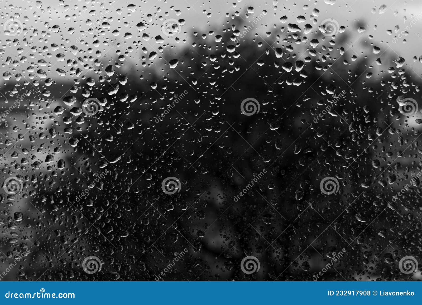 raindrops on the glass. window in march. season specific. portugal. almada. early spring.