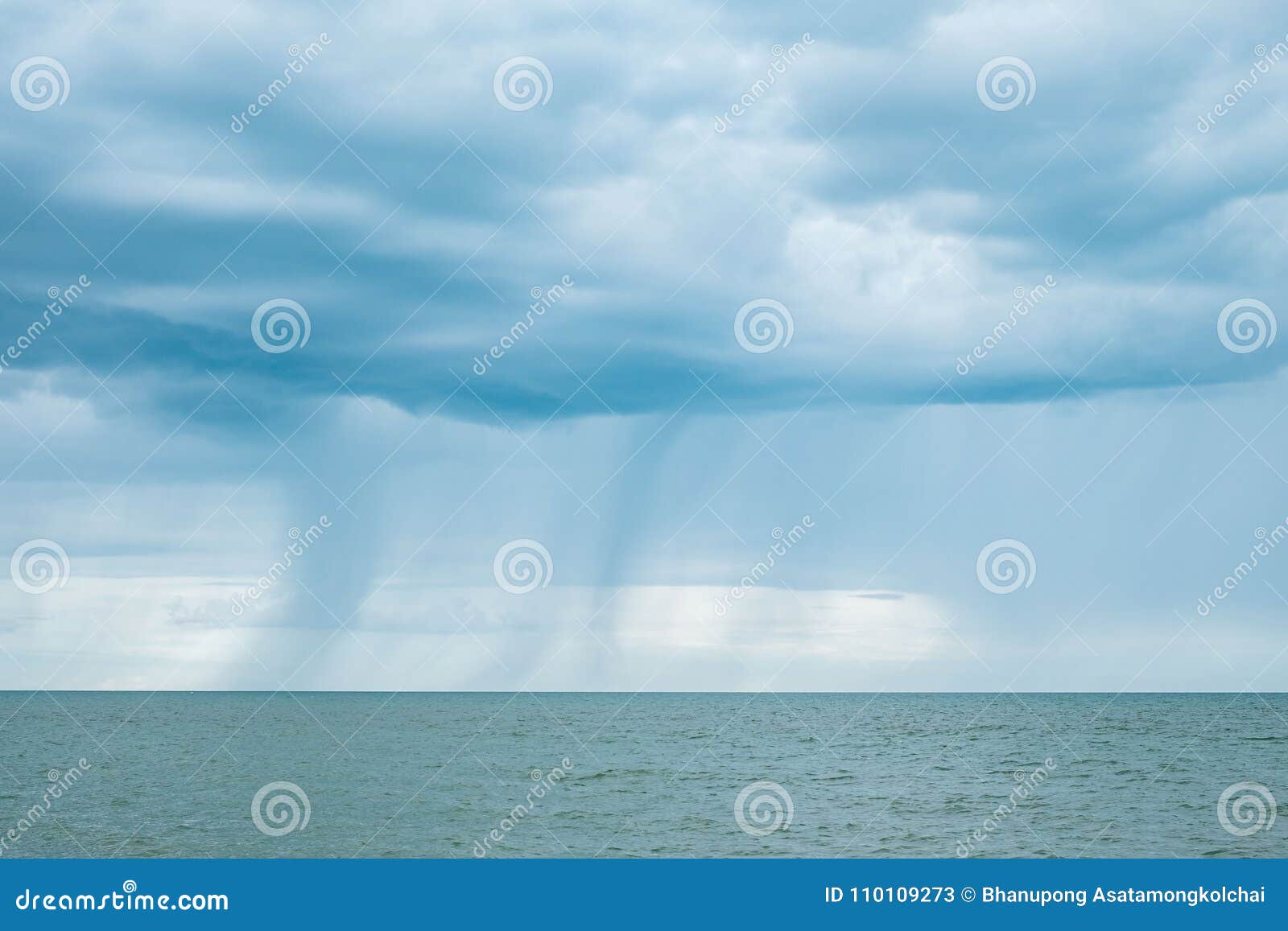 Raining cloud seascape stock image. Image of blue, overcast - 110109273